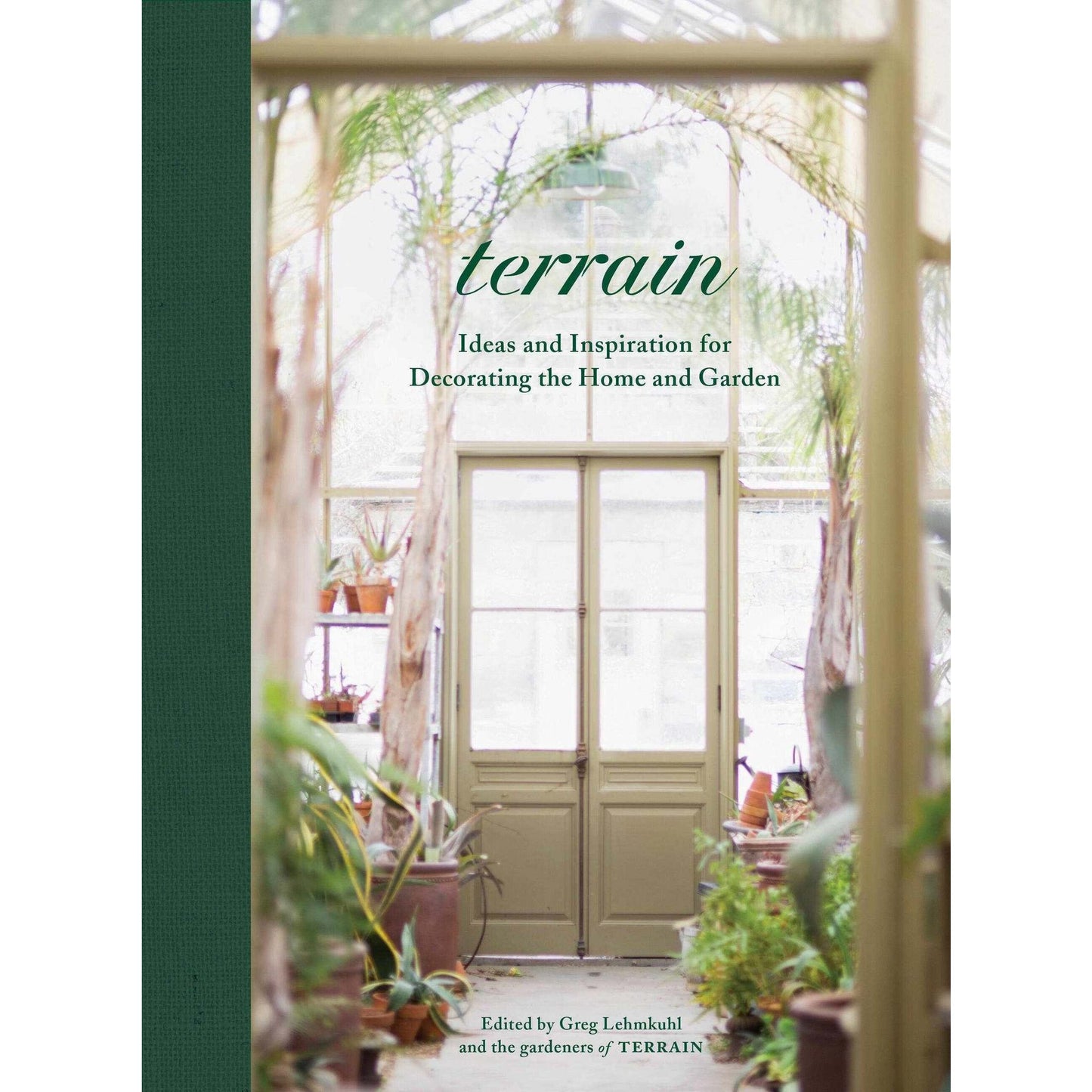 Terrain book cover with garden-themed home decor ideas and lush plants inside a greenhouse setting