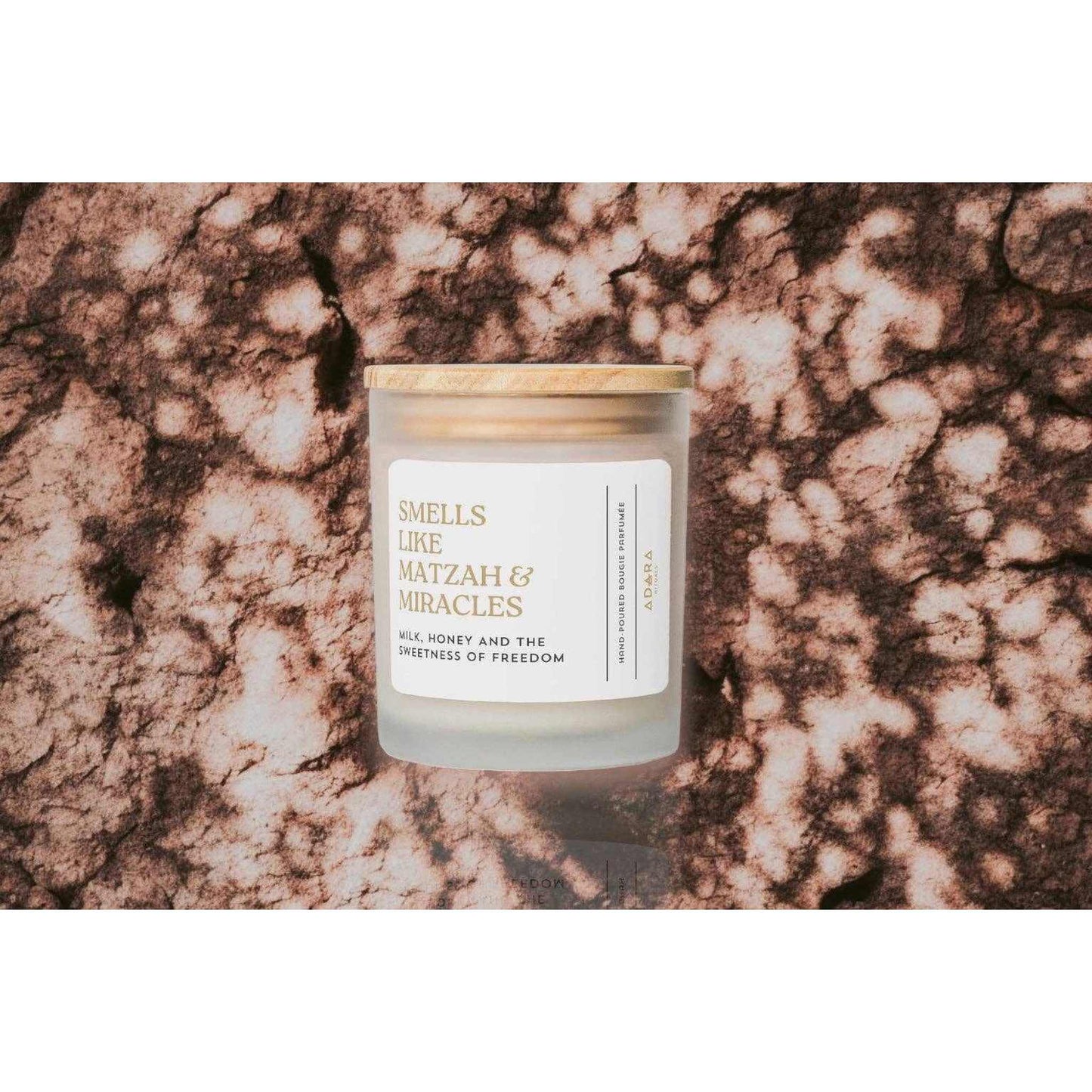 Smells Like Matzah & Miracles scented candle with milk, honey, and matzah fragrance in frosted jar with wooden lid