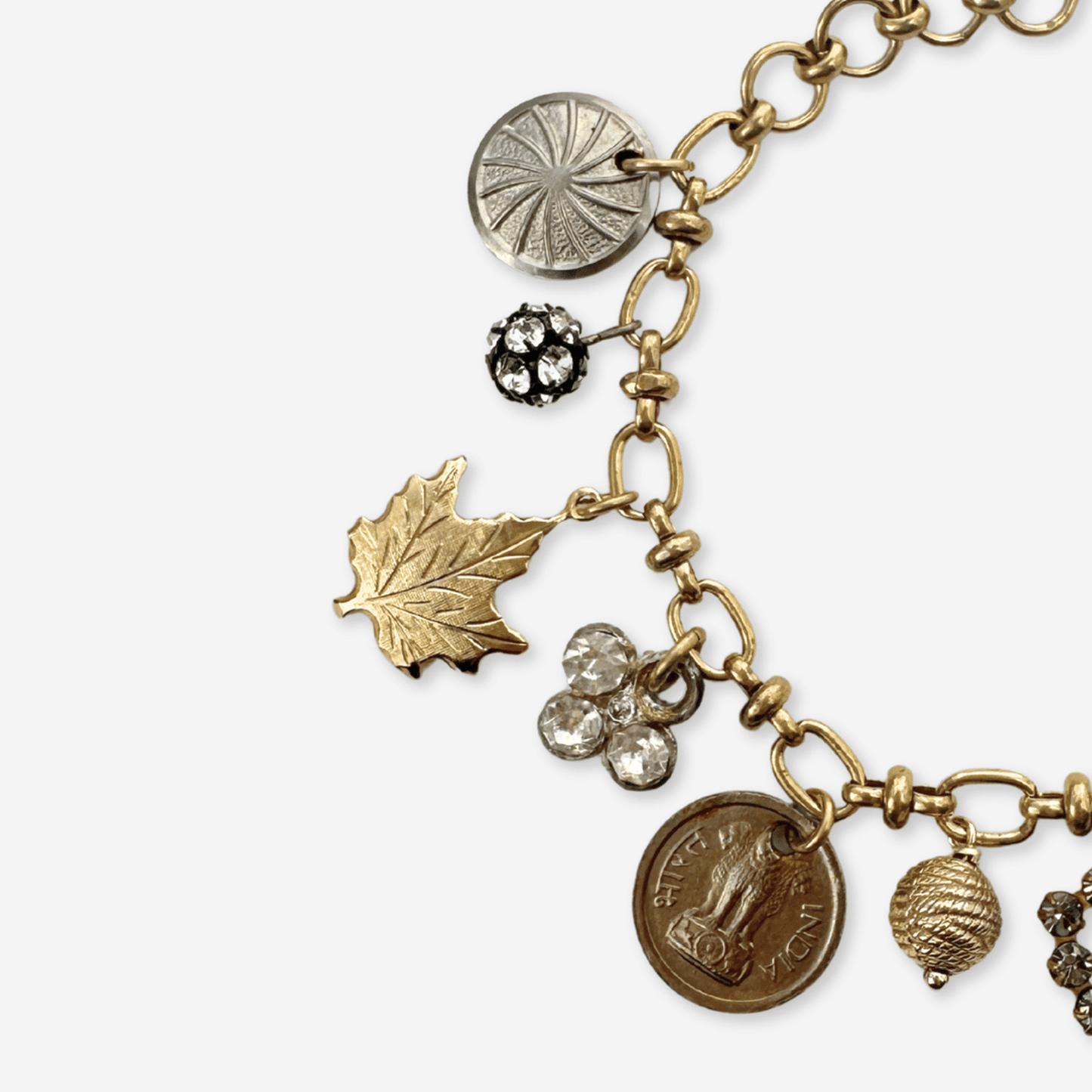 
                  
                    Repurposed vintage mixed metal charm bracelet - Curated Home Decor
                  
                