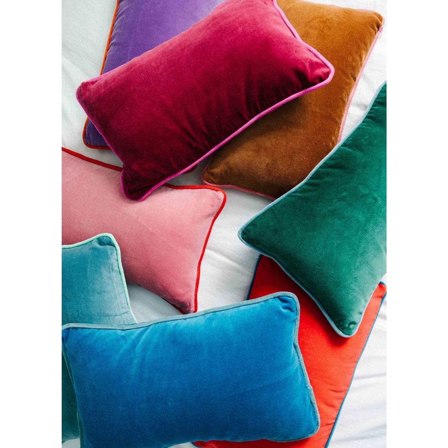 Charliss Velvet Lumbar Pillow in aqua and mint velvet fabric with plush down alternative insert