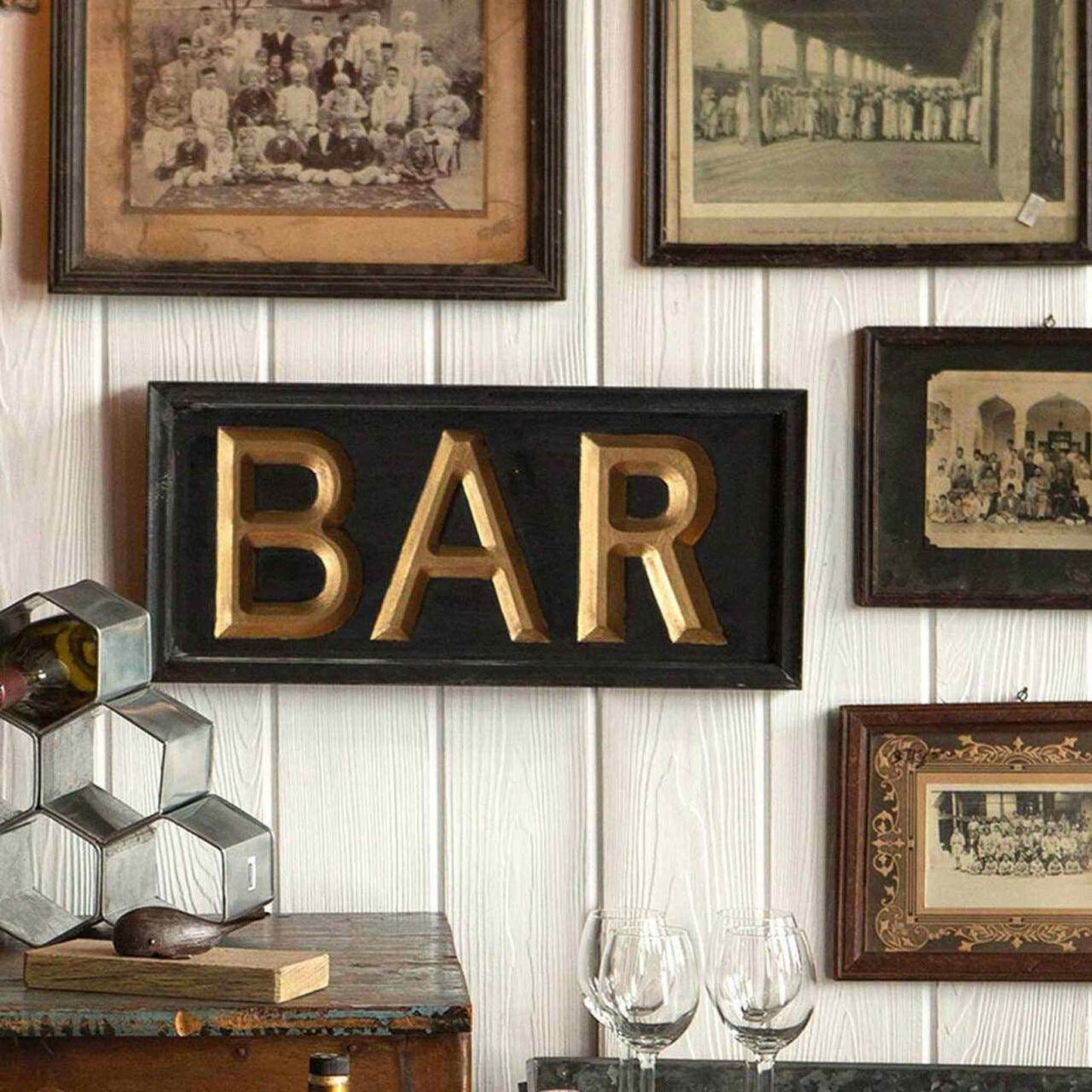 Vintage wooden bar sign with gold letters "BAR" on black background wall decor