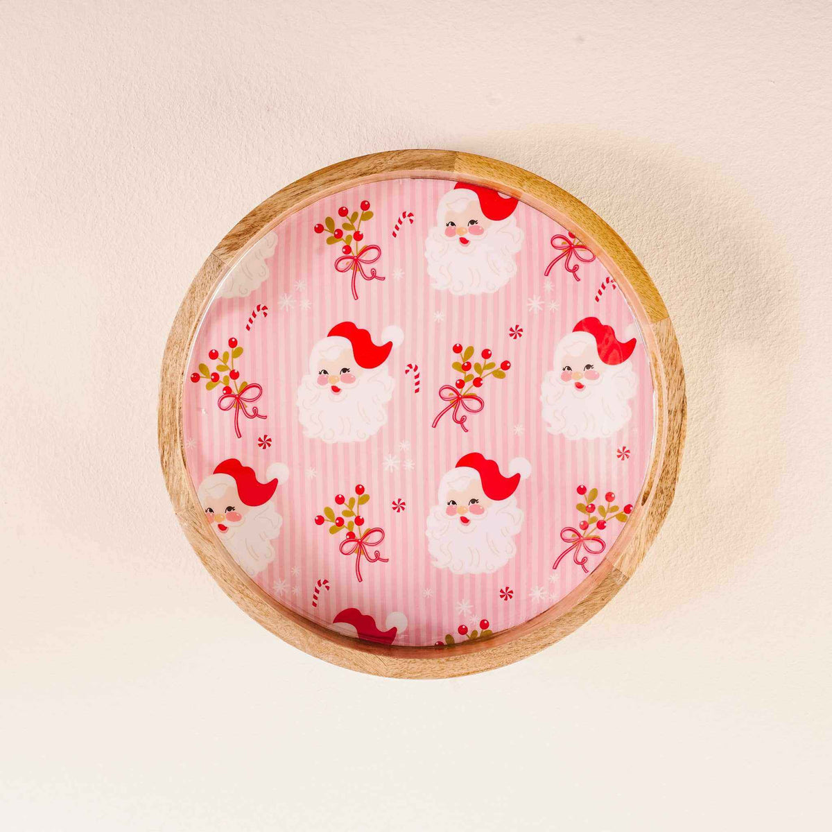 
                  
                    Large round wood enamel tray with Holly Jolly Santa design and bamboo handles
                  
                