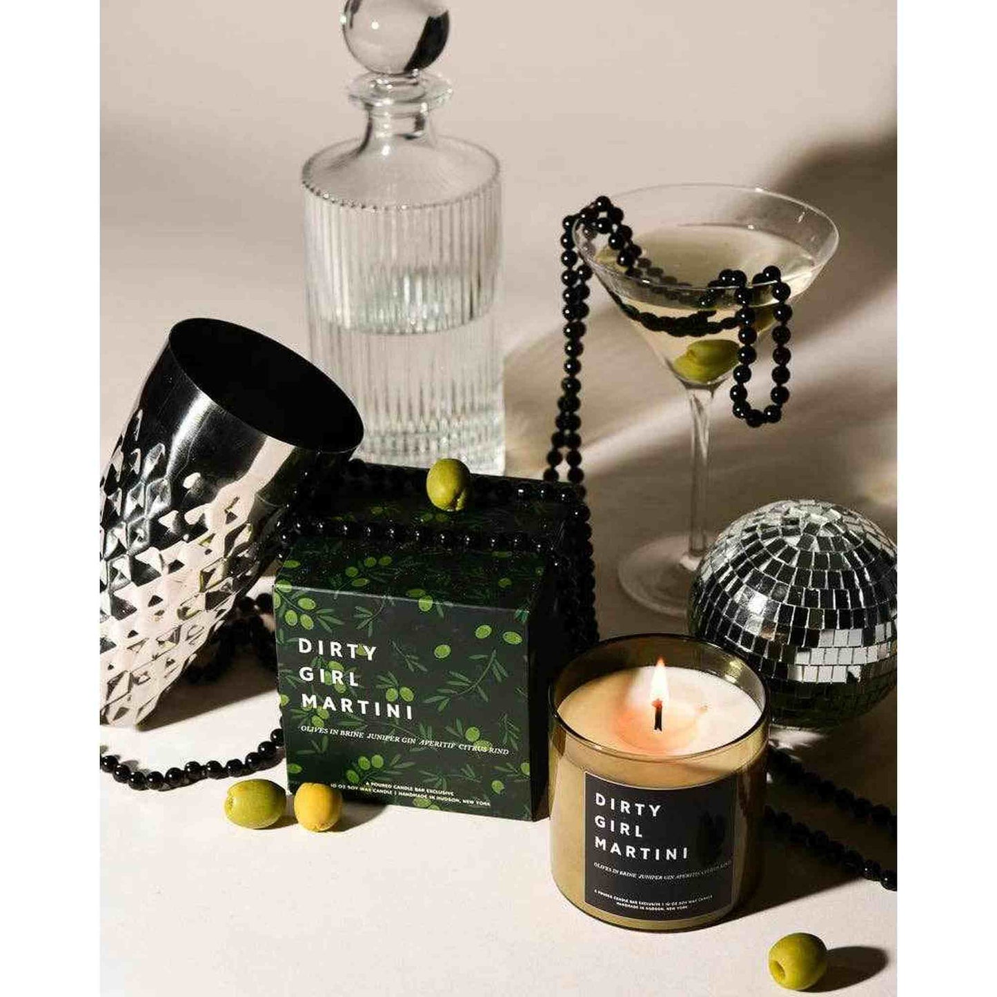 Dirty Girl Martini Candle with olives in brine and juniper-infused gin splash