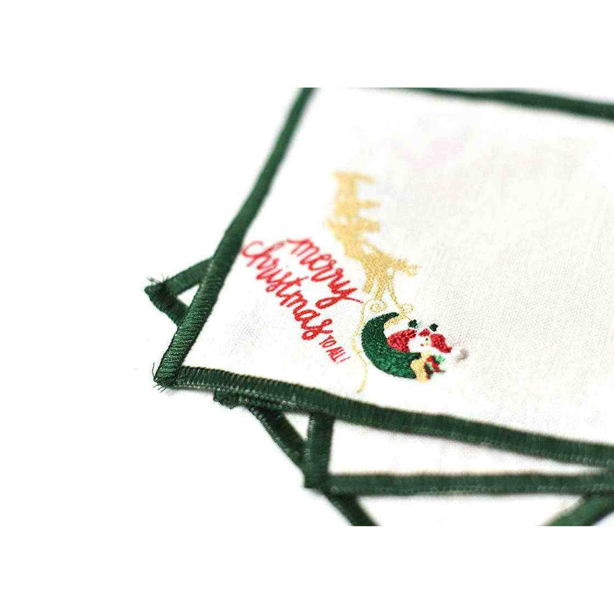 
                  
                    Set of 4 Flying Santa Cocktail Napkins with green trim and festive Christmas design
                  
                