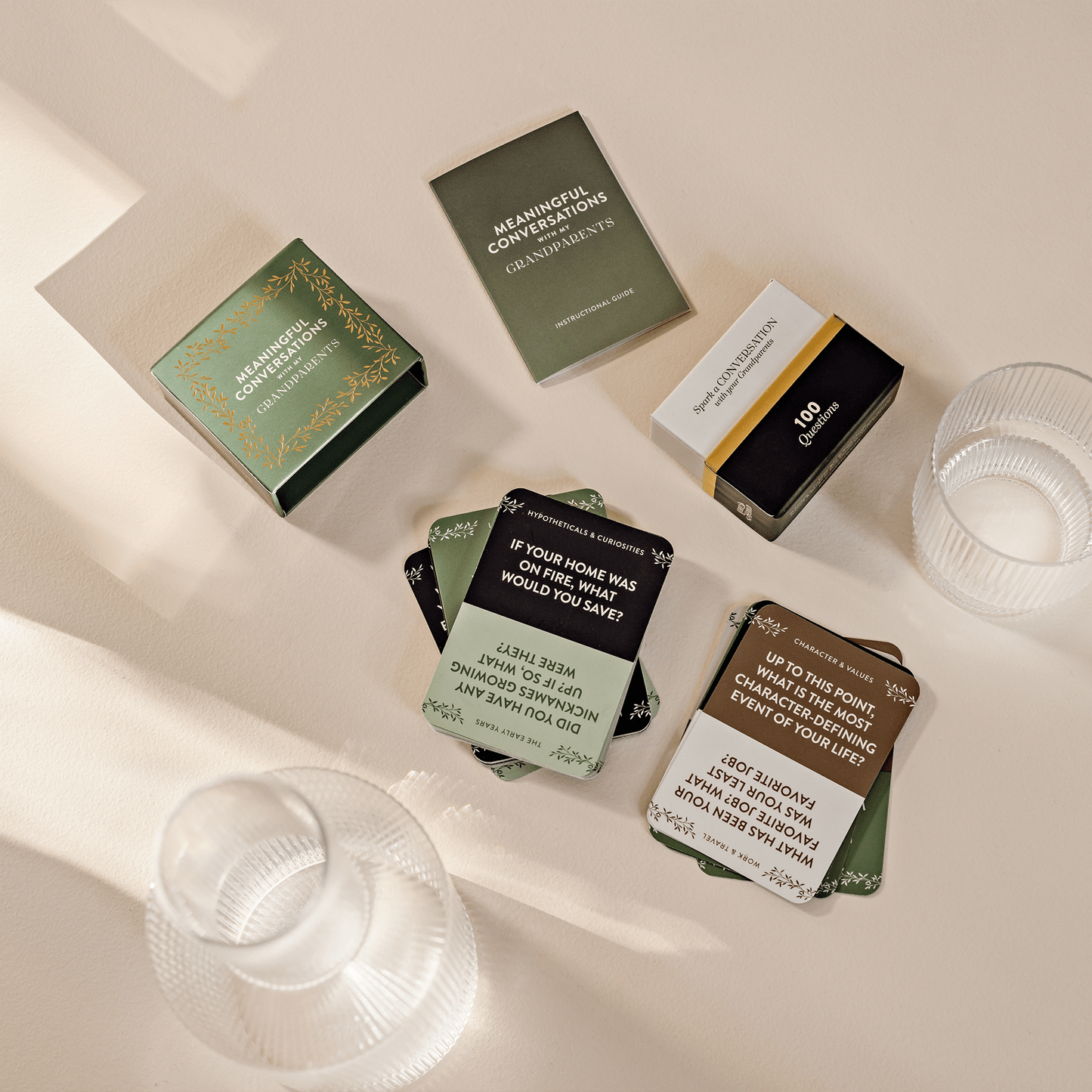 Meaningful Conversations with My Grandparents card deck with elegant green box and conversation starter cards on table