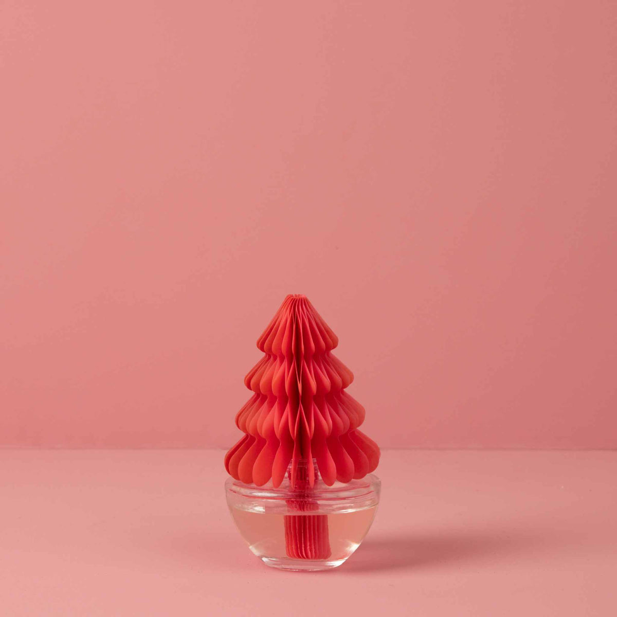 
                  
                    Christmas Tree Honeycomb Diffuser with pink paper tree and clear glass vase for Sweet Grace fragrance
                  
                