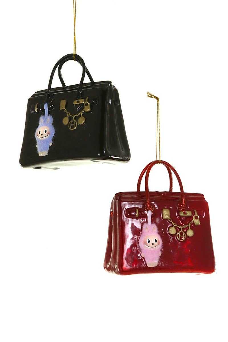 Christmas Carousel Collection glass luxe bag ornaments with playful monster motif in black and red