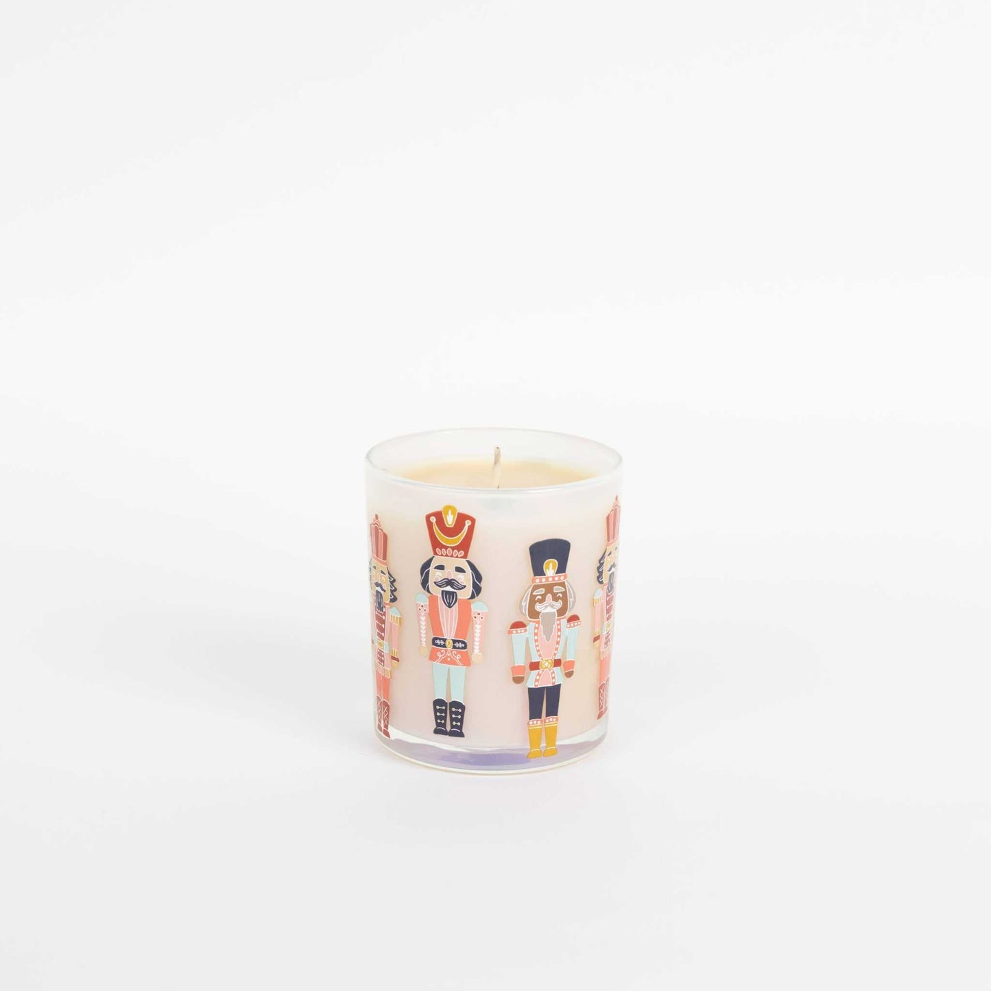 Sweet Grace Candle in iridescent jar with festive nutcracker decals and soy-blend wax