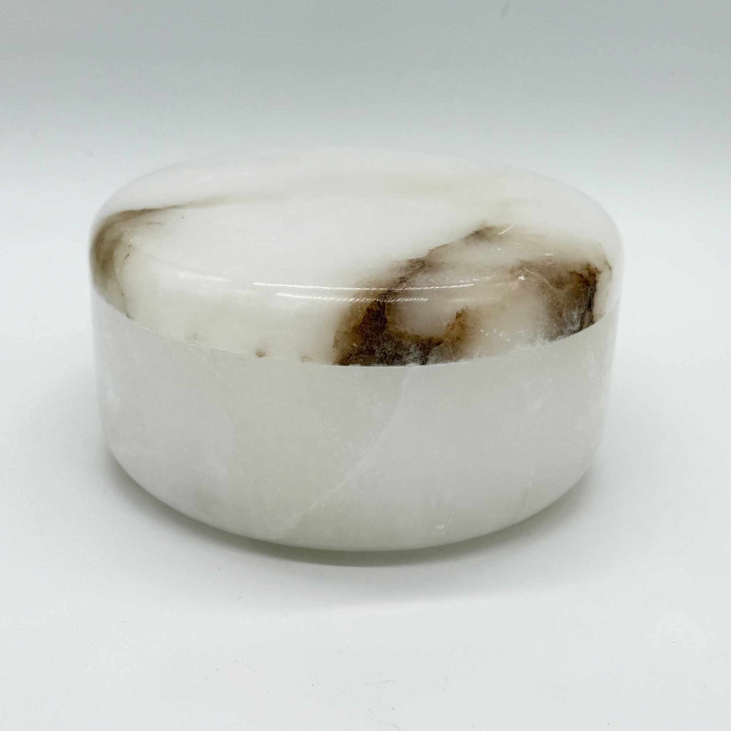 6-inch alabaster lidded round box with natural veins and elegant design