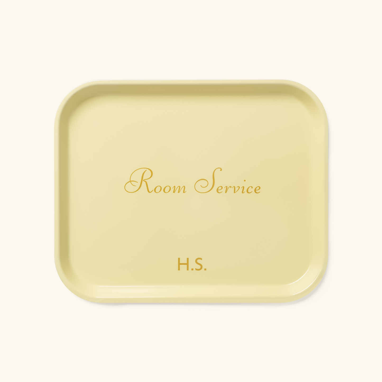 Light yellow rectangular room service tray with gold text and rounded edges, made of lightweight fiberglass, 8 by 10 inches.