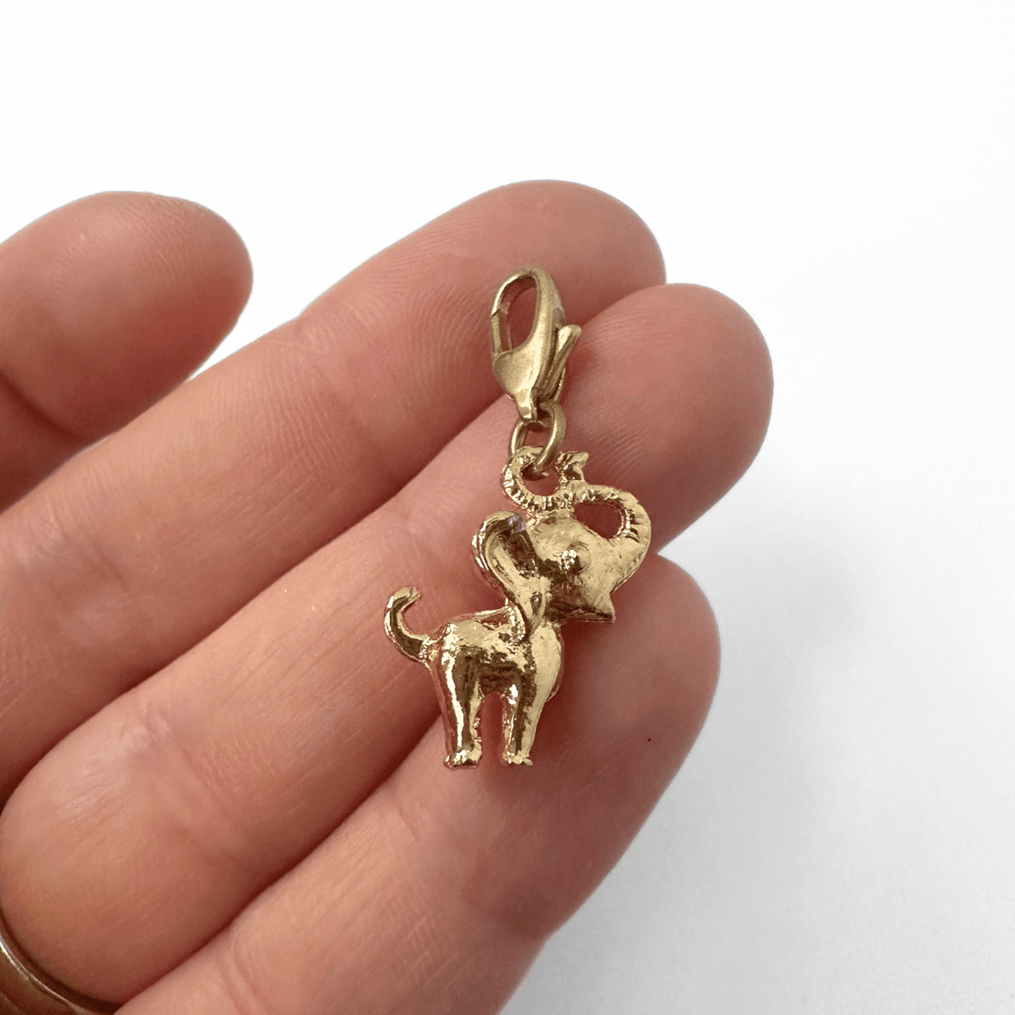 Vintage gold tone small elephant charm pendant with brass clasp