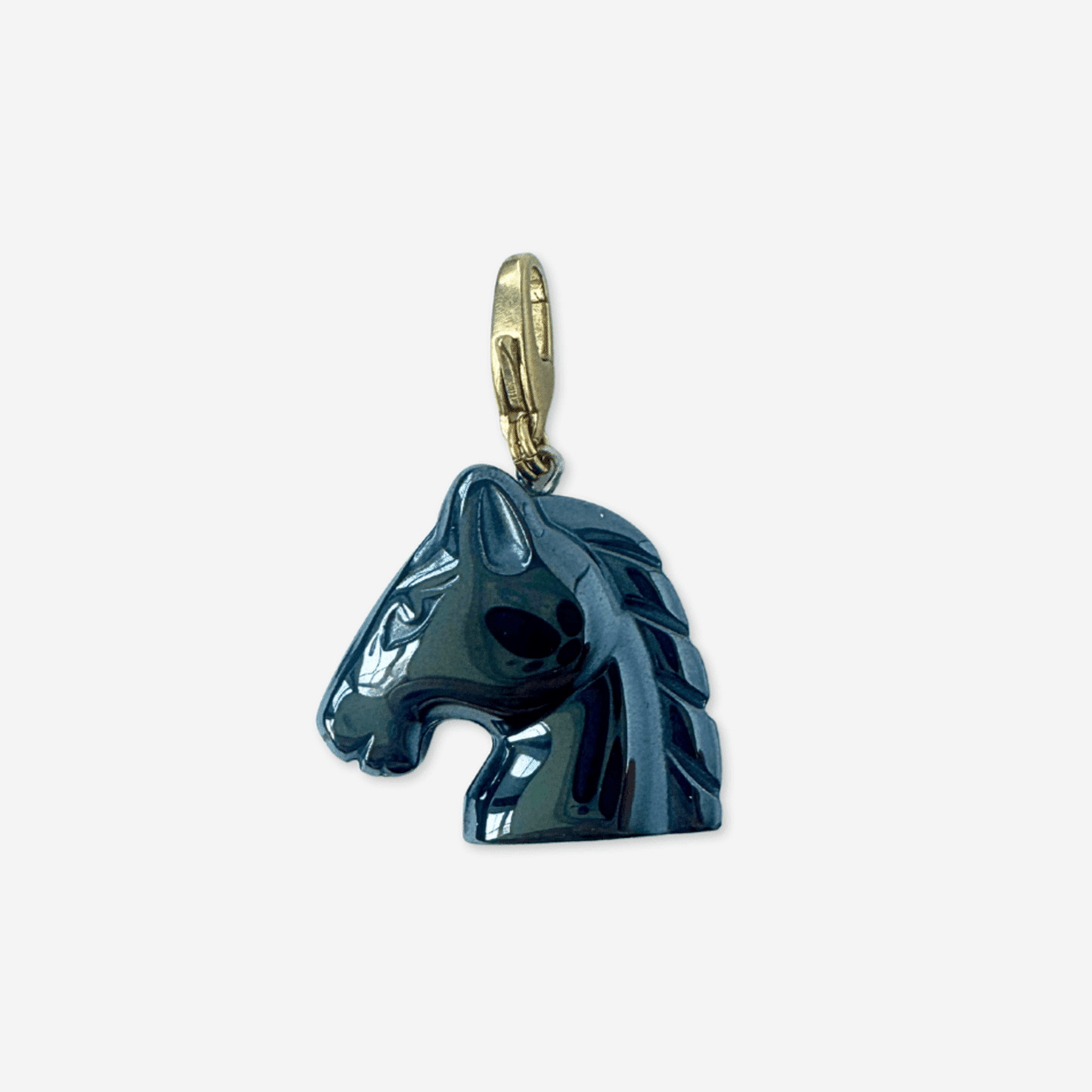 Vintage carved hematite horse head charm with brass clasp in deep charcoal color