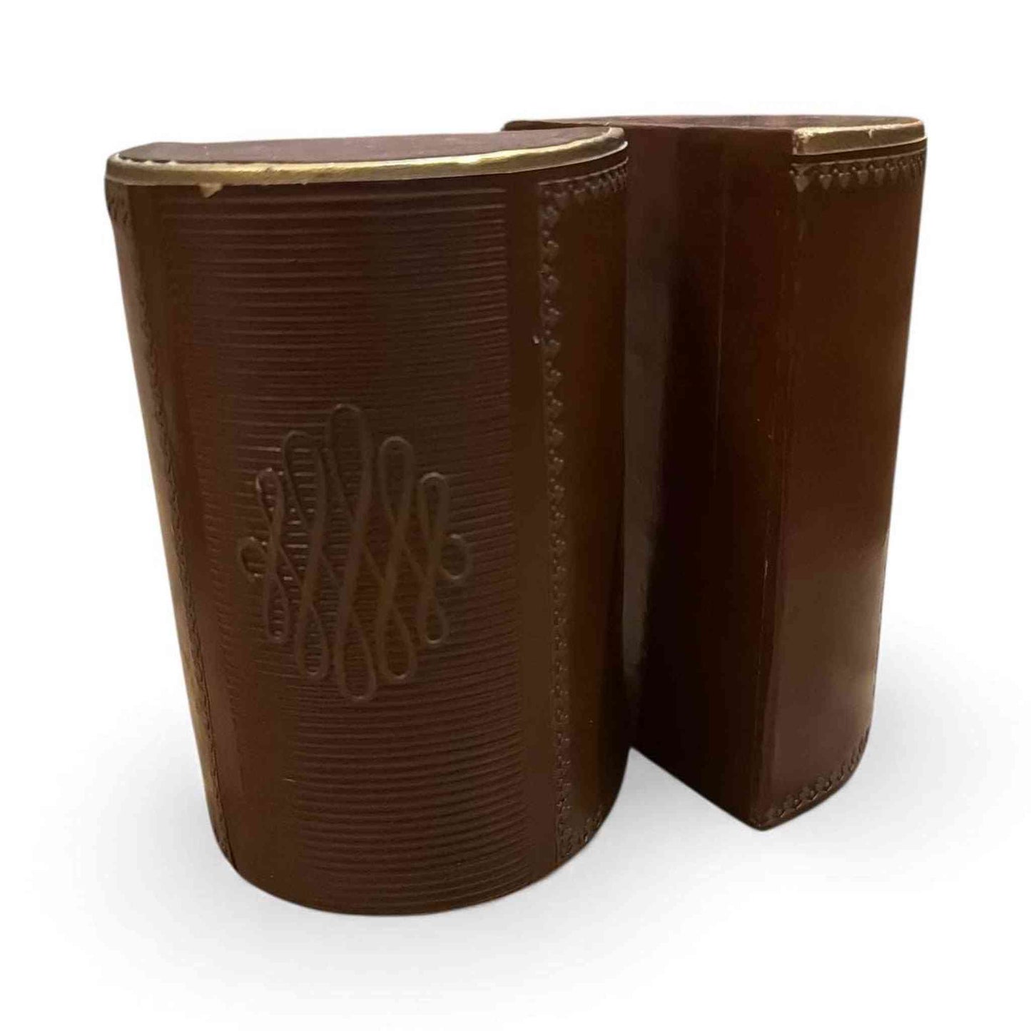 Vintage Italian leather bookends with embossed pattern and gold accents