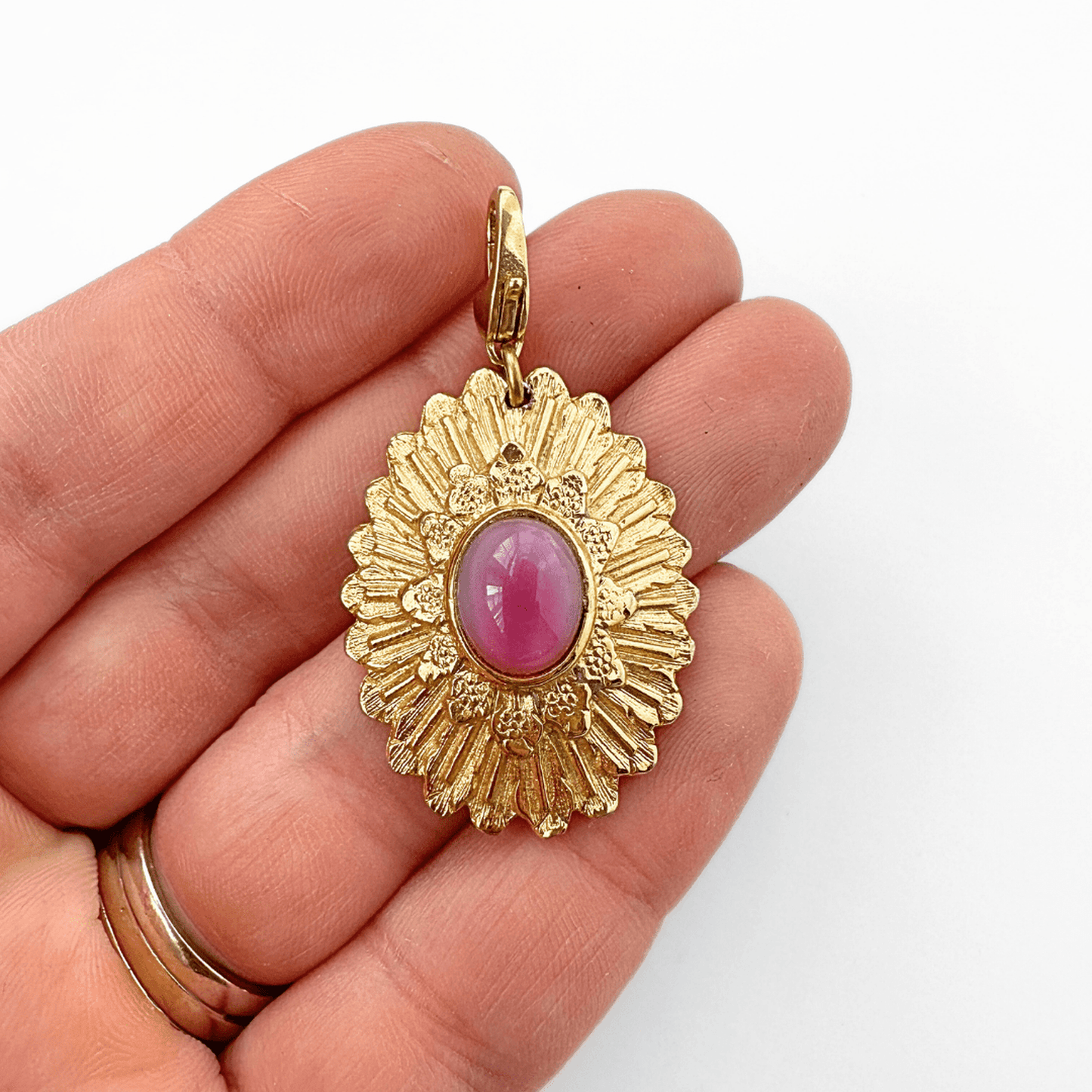Vintage large gold oval sunburst charm with pink moonstone center and brass clasp