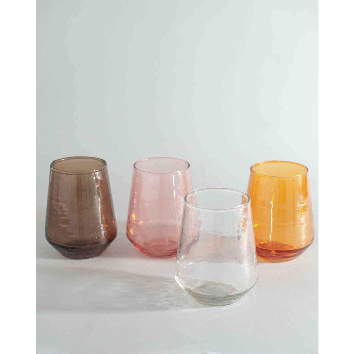 
                  
                    A pair of amber handblown hammered glass water tumblers. - Curated Home Decor
                  
                