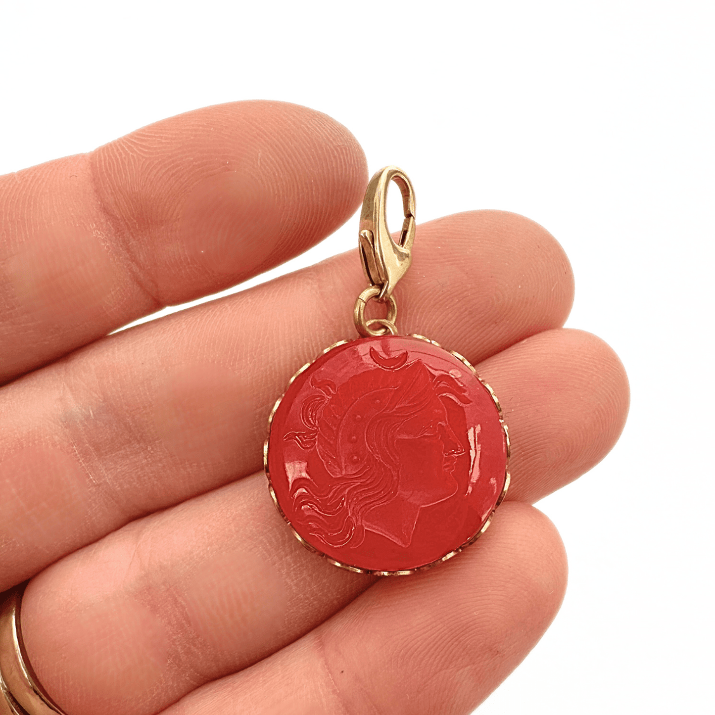 Vintage red carved carnelian charm with Roman soldier carving and lobster clasp