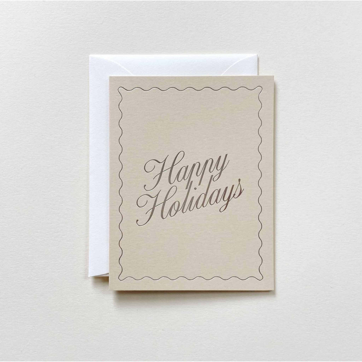 Happy Holidays No. 25 card in sand with metallic silver foil text and natural envelope