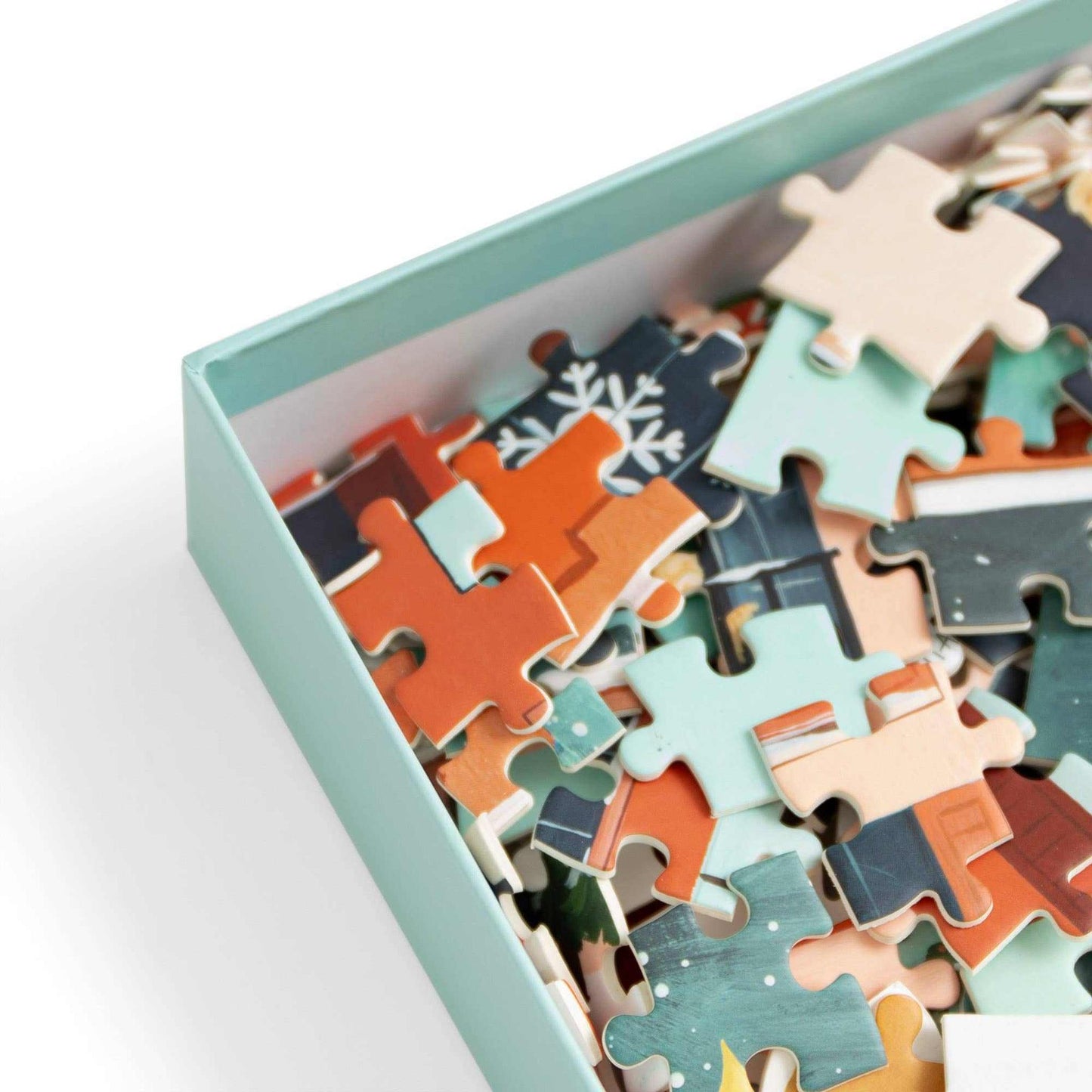 Christmas in the City 500 piece jigsaw puzzle with festive cityscape and holiday decorations