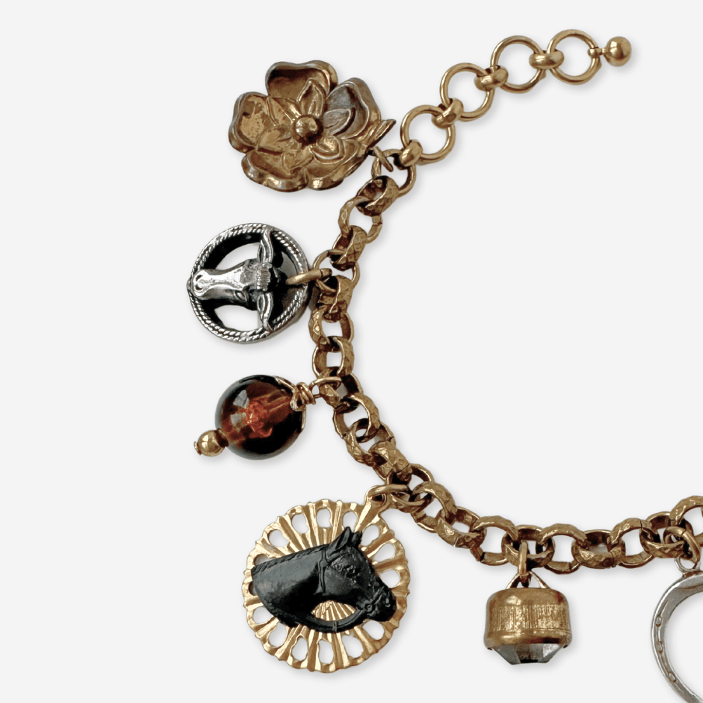 
                  
                    Repurposed vintage western - themed charm bracelet - Curated Home Decor
                  
                