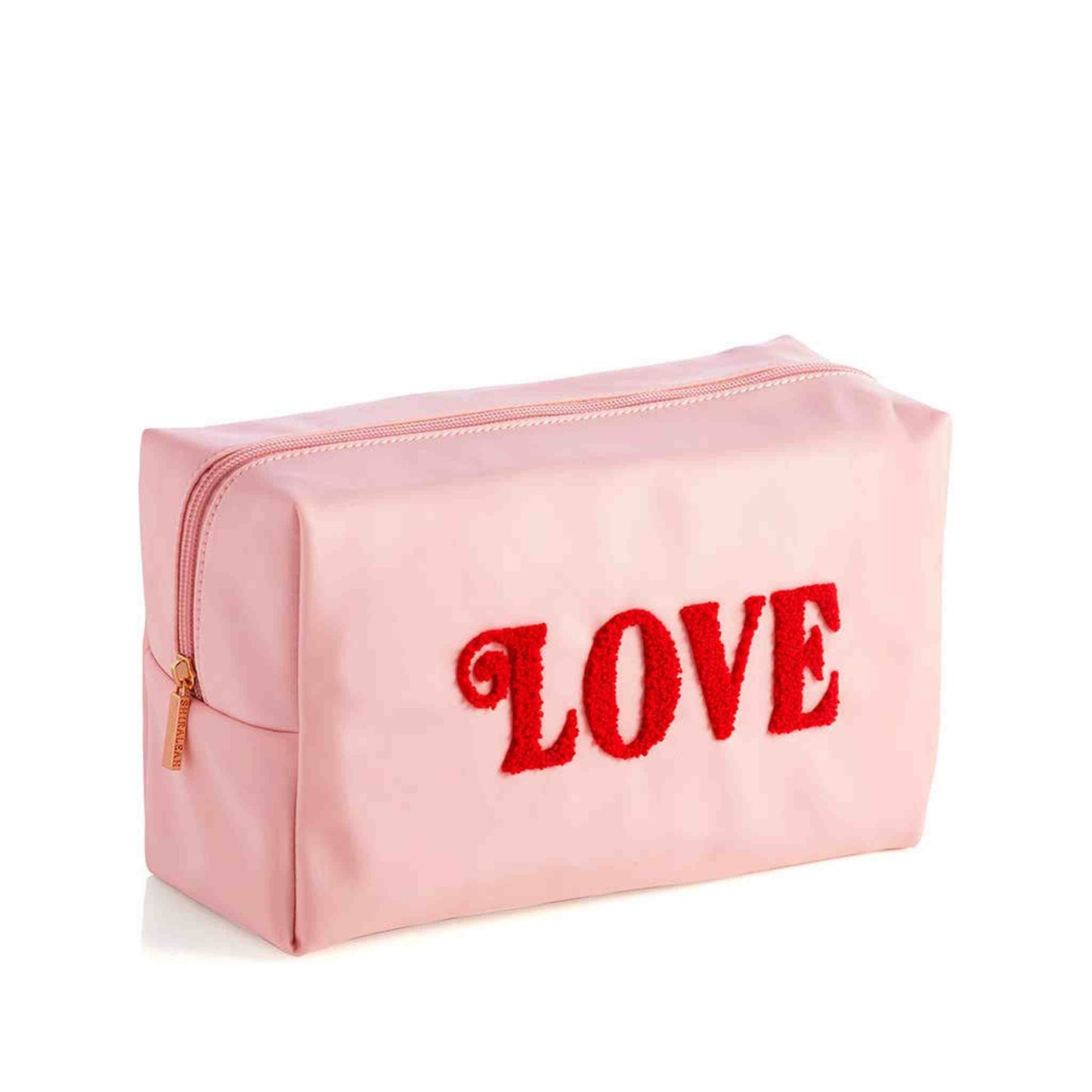 Blush pink cosmetic pouch with red sherpa LOVE lettering and gold zipper