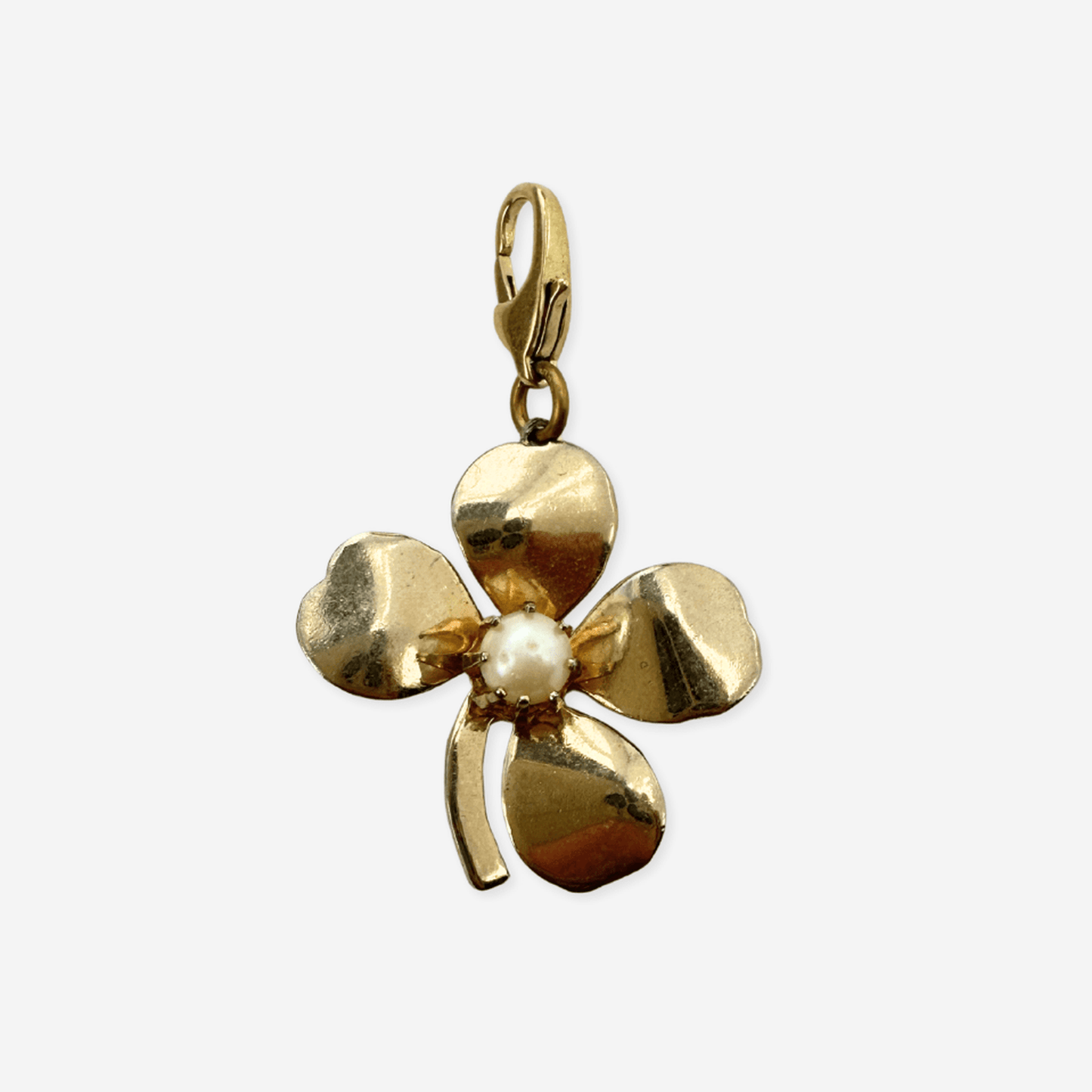 Vintage gold four leaf clover charm with pearl center and brass lobster clasp