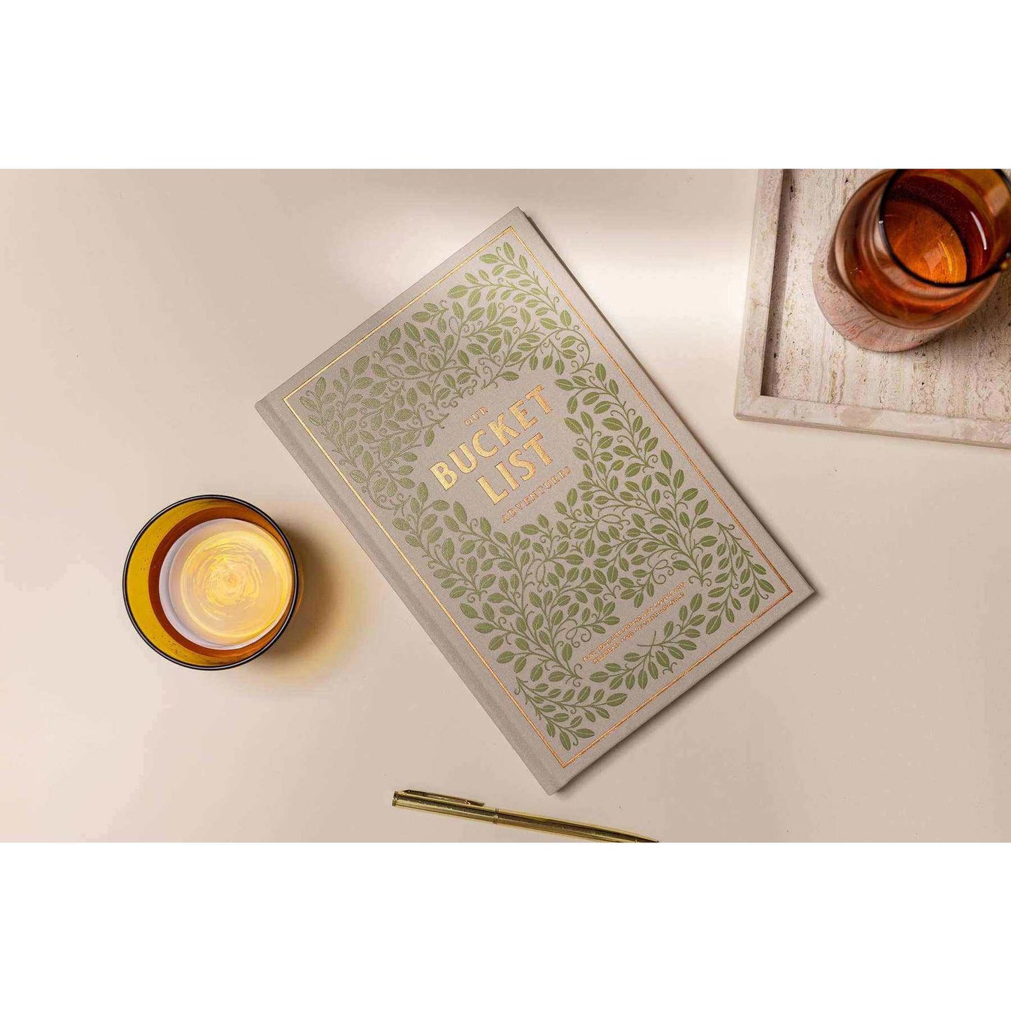 Elegant hardcover bucket list adventures journal with bronze foil cover for couples planning life dreams and memories