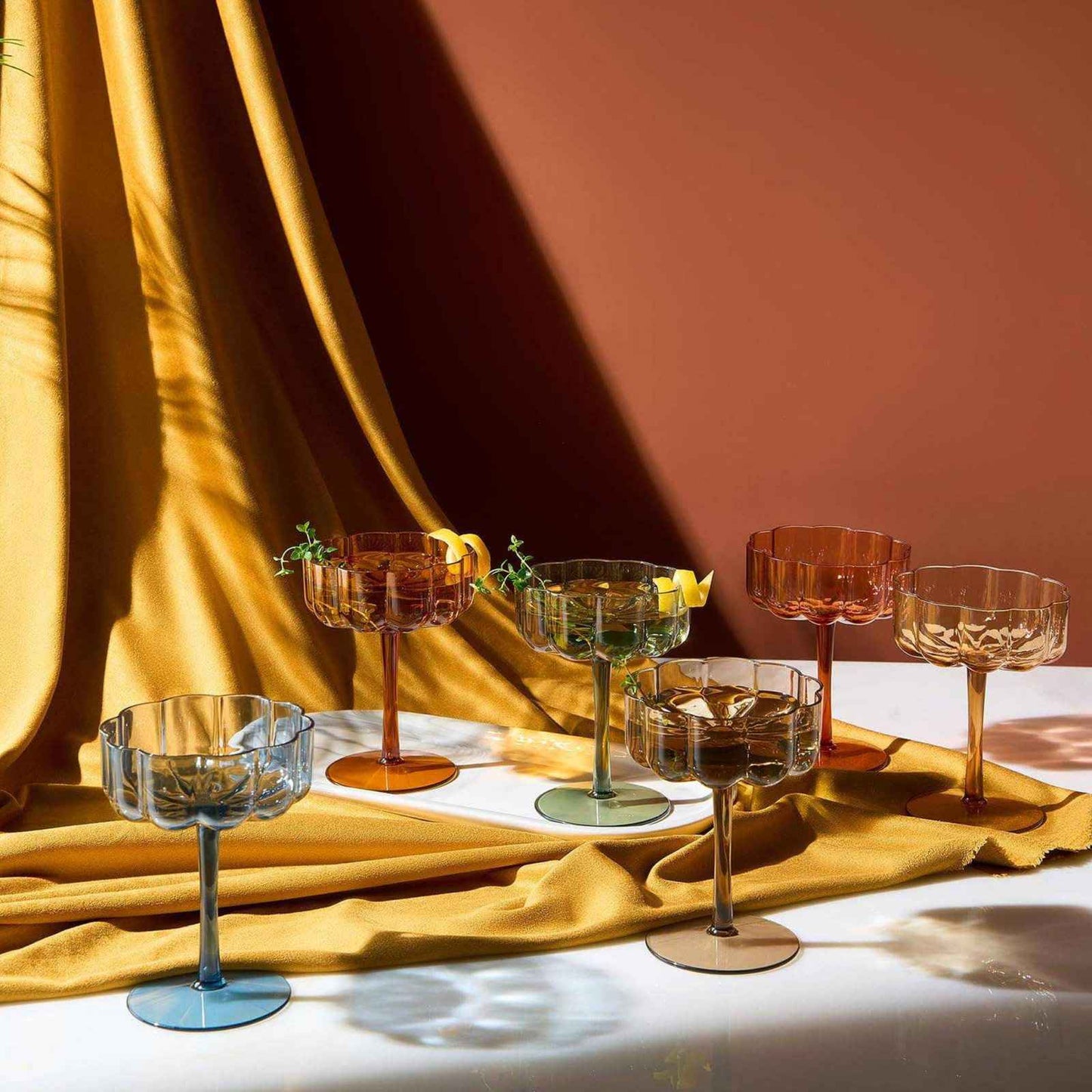 Set of six shatterproof acrylic flower glasses with wavy vintage Art Deco design, 5 inches tall and 3.6 inches diameter.