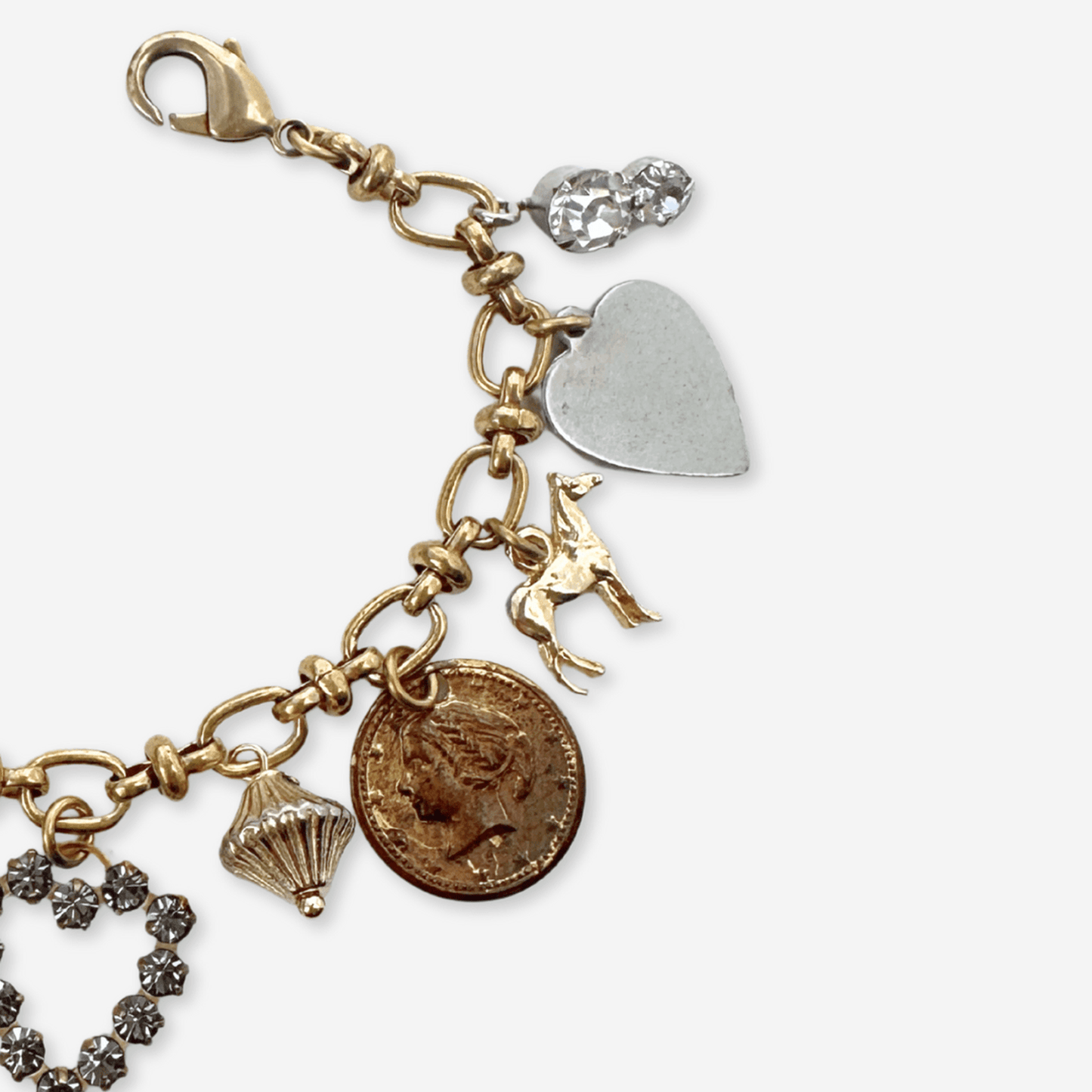 
                  
                    Repurposed vintage mixed metal charm bracelet - Curated Home Decor
                  
                
