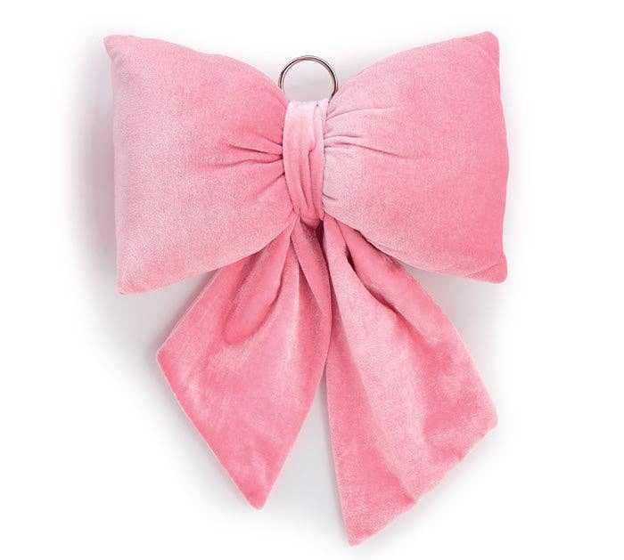 11" pink plush velvet bow with metal ring for hanging and soft textured fabric design