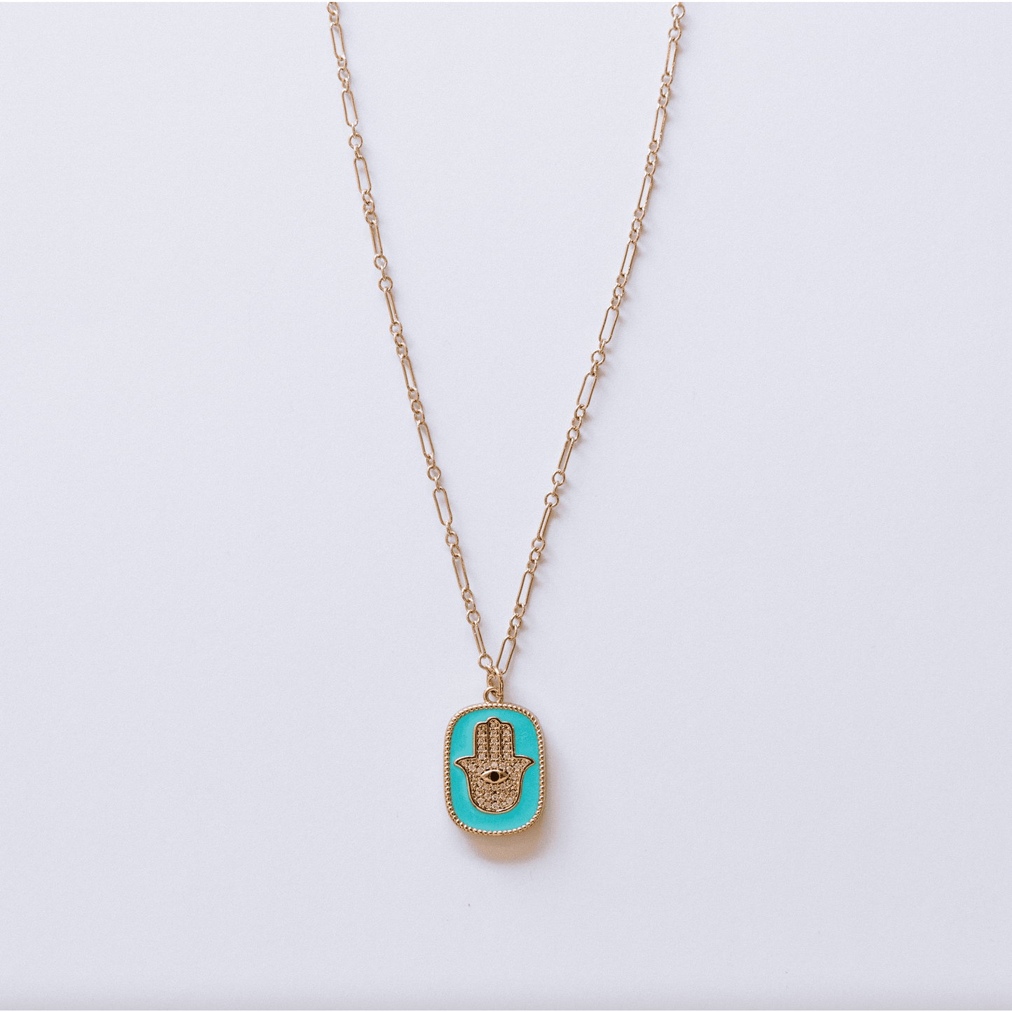 
                  
                    The Hamsa Evil Eye Tag Necklace - Curated Home Decor
                  
                