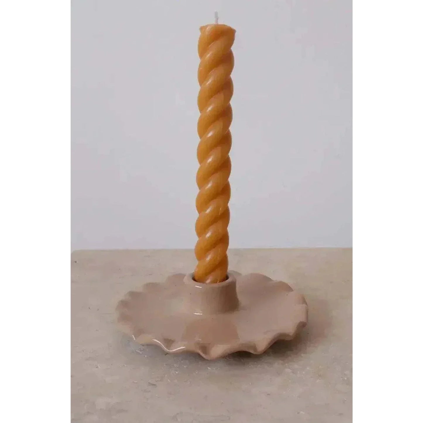 Pink Nénuphar handmade ceramic candle holder with scalloped plate and twisted taper candle