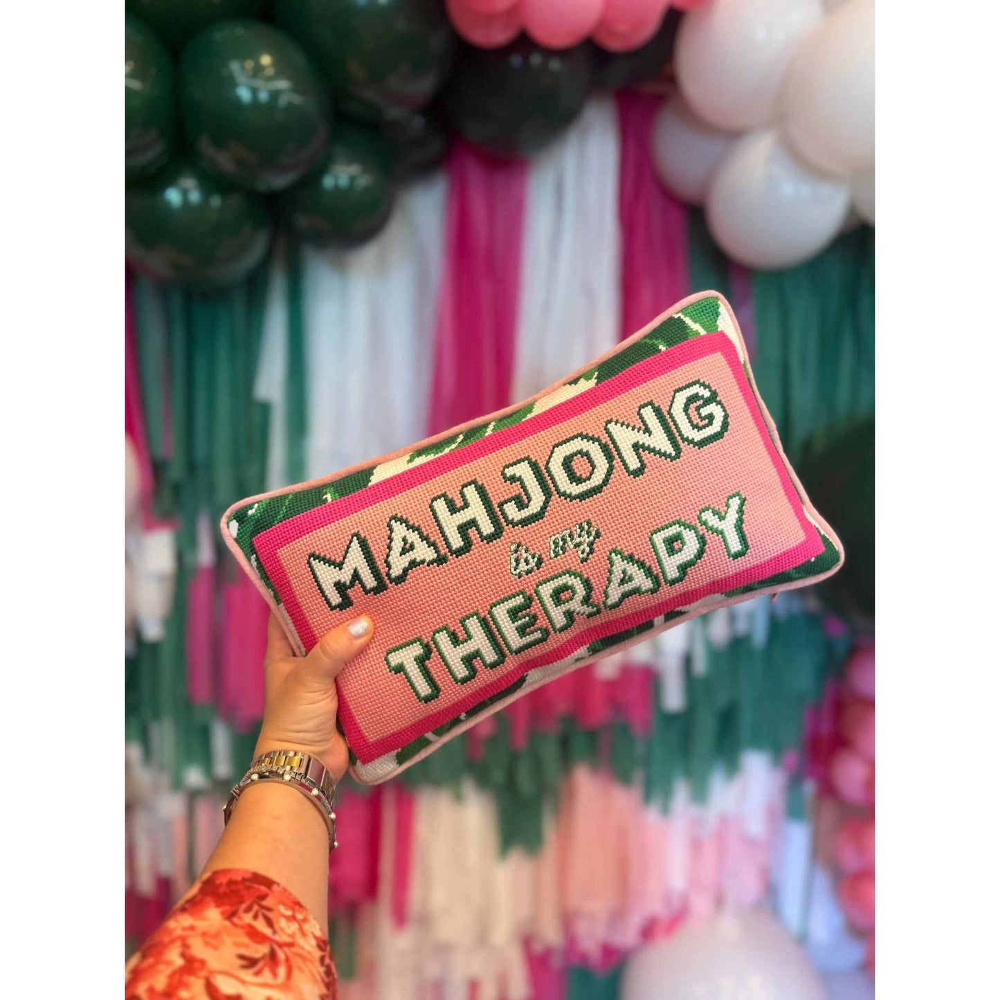 Mahjong is my Therapy needlepoint pillow with vibrant colors and intricate design held in hand