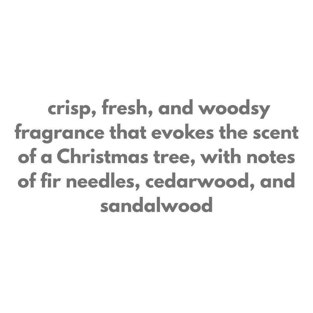 Red Ski 10oz Christmas Candle with fresh Fraser fir, cedarwood, and sandalwood scent in white glass with festive paper wrap