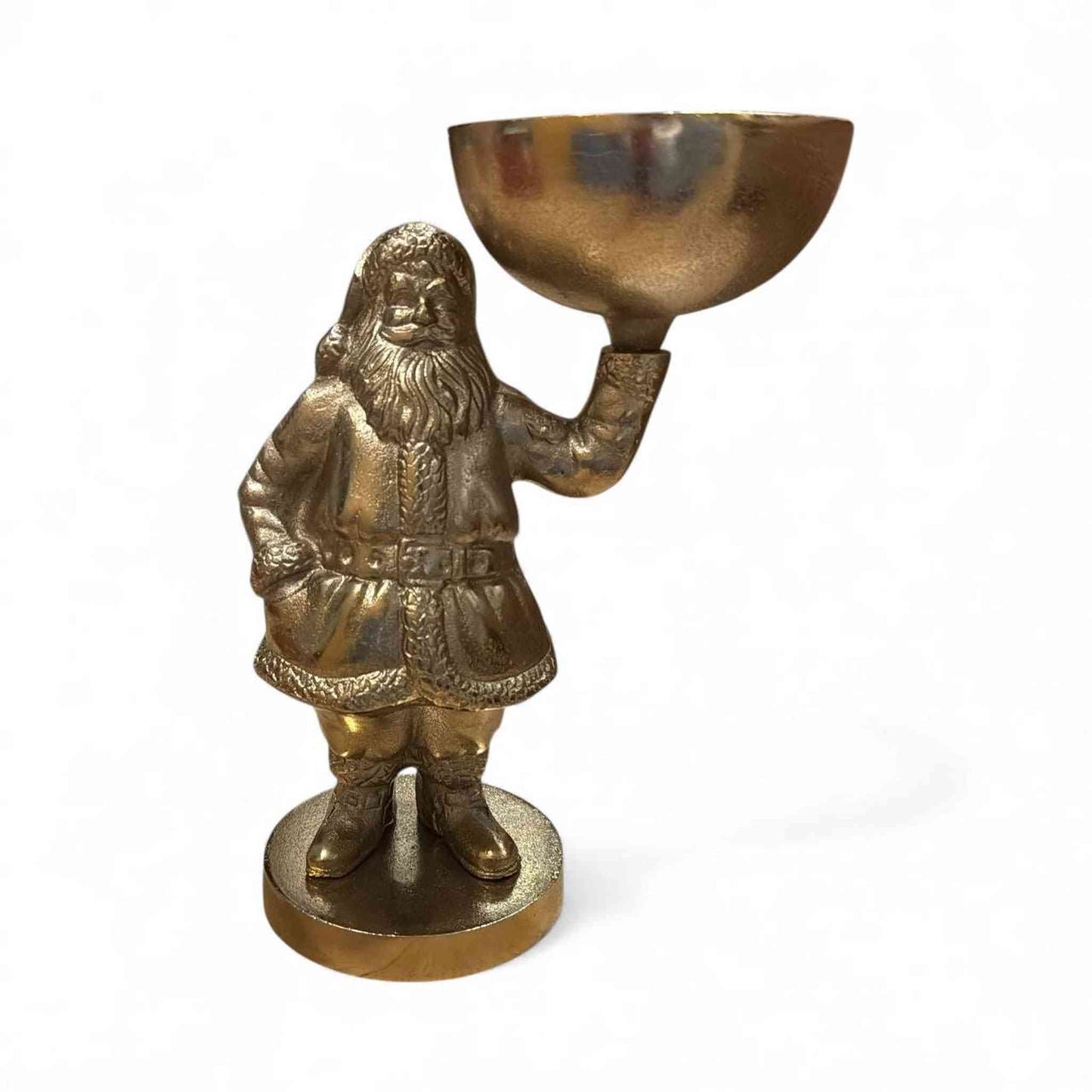 Gold Santa figurine holding a round candy dish on a circular base with detailed coat and boots