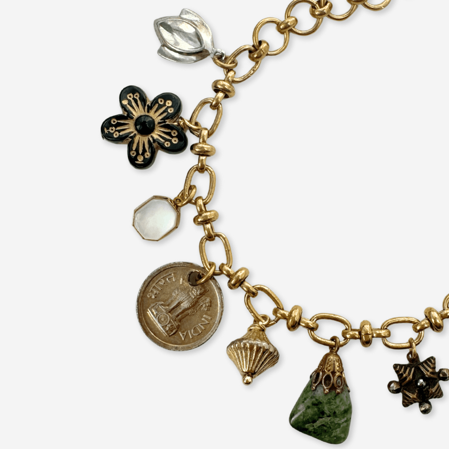 
                  
                    Repurposed vintage mixed charm bracelet - Curated Home Decor
                  
                