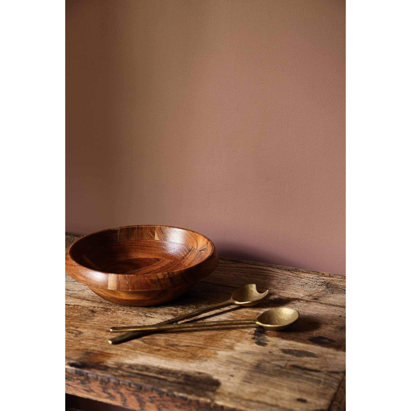 Handcrafted wooden salad bowl with lipped edge and matte finish showcasing natural mango wood grain