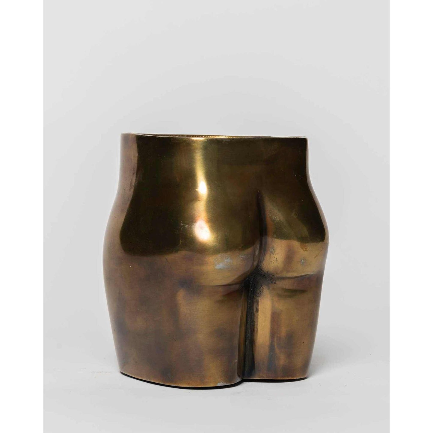 Iron Butt Negroni Nights Candle sculptural antique brass double wick soy wax candle shaped like a butt