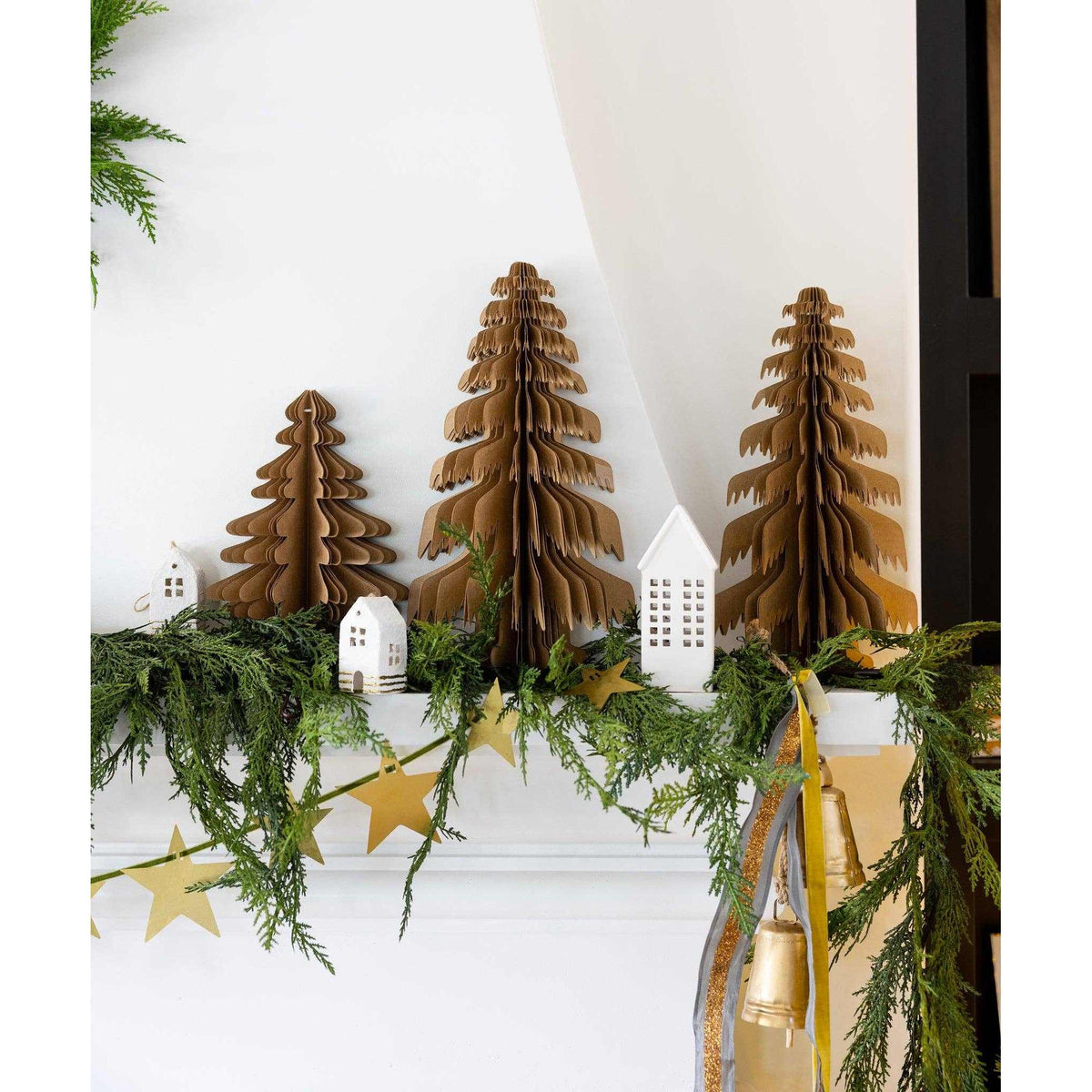 
                  
                    Christmas Memories medium kraft paper Christmas tree decor in 11-inch size for festive holiday display
                  
                