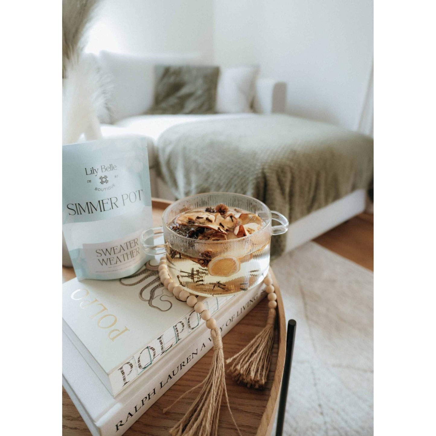 Sweater Weather Simmer Pot stovetop potpourri with citrus, spice, and evergreen in cozy home setting