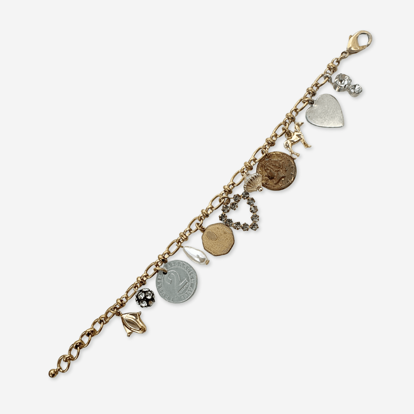 Repurposed vintage mixed metal charm bracelet with coins, beads, and rhinestones on adjustable raw brass chain