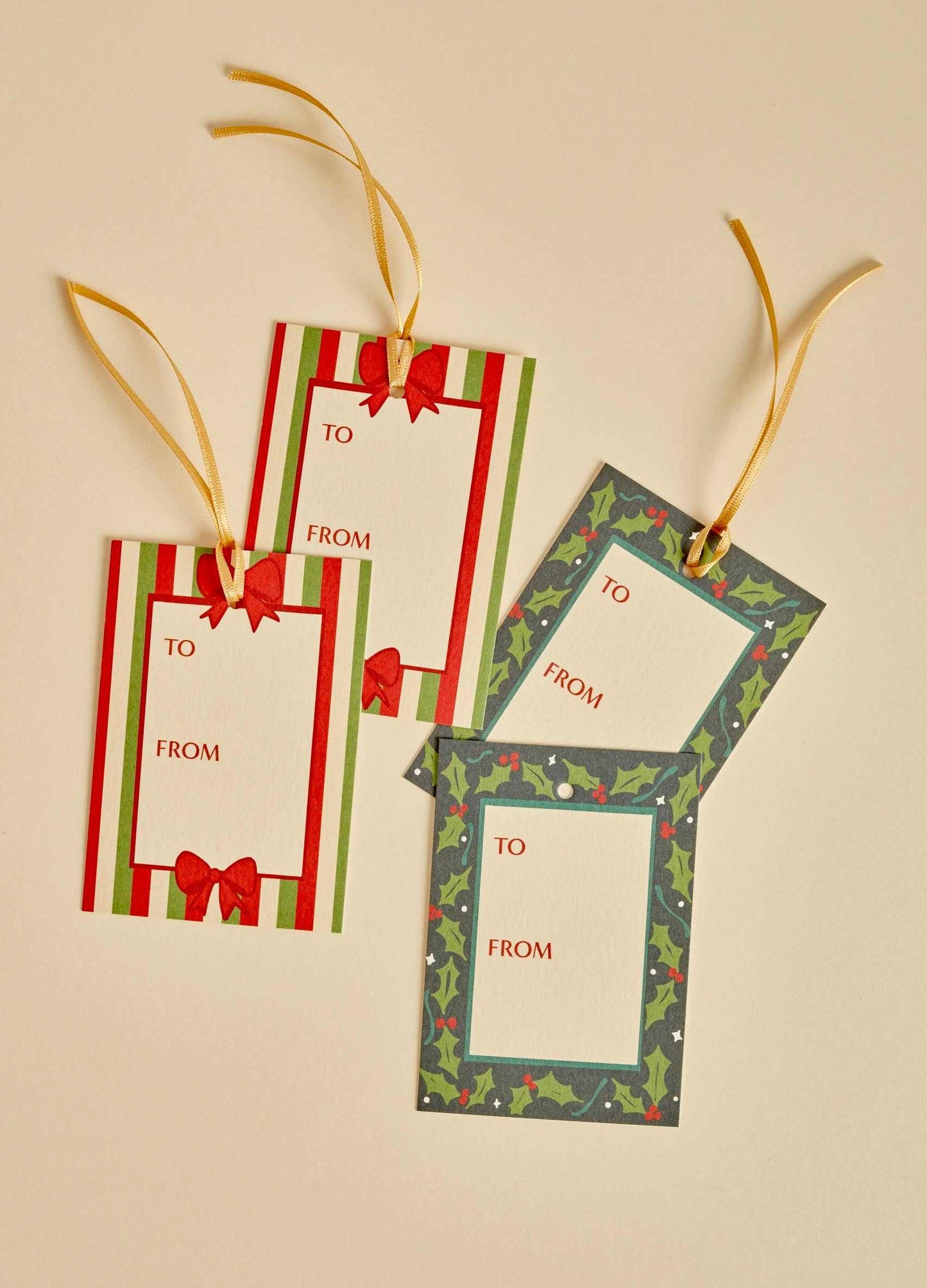 Set of 8 festive gift tags with holly and ribbon borders printed on FSC certified card