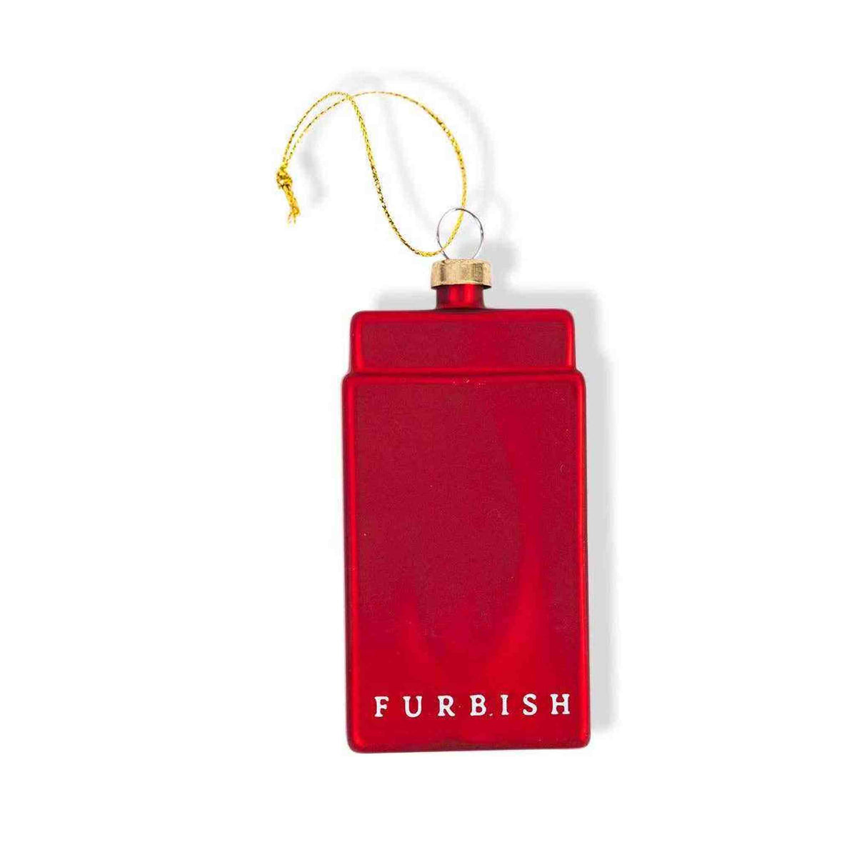 
                  
                    Red glass Santa's Workshop Matchbook Ornament with gold hanging string and Furbish branding
                  
                