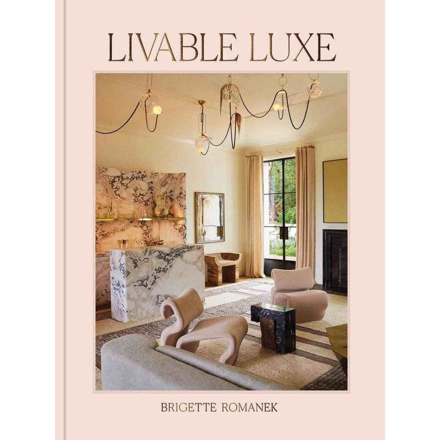 Livable Luxe book cover featuring luxurious interior design by Brigette Romanek with modern furniture and elegant lighting