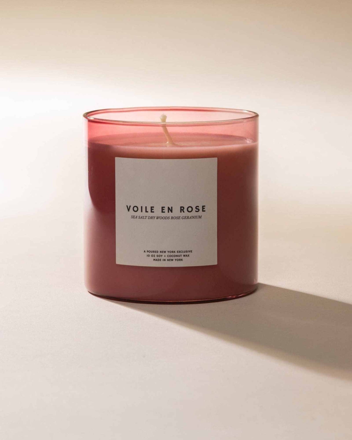 Voile en Rose 10 oz soy coconut wax candle with fresh rose, geranium, sea salt, and dry woods fragrance