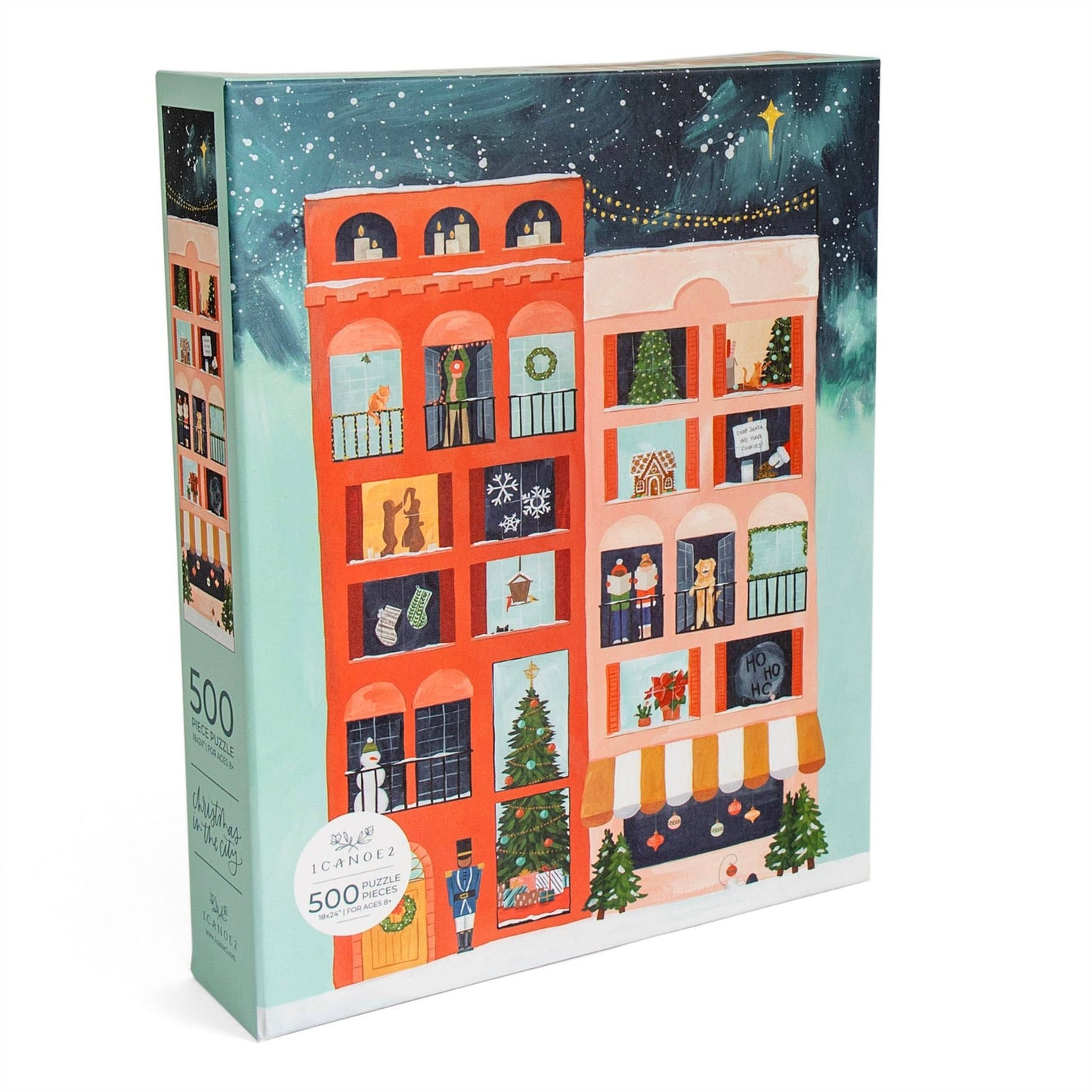 Christmas in the City 500 piece jigsaw puzzle featuring festive decorated city buildings under a starry night sky.