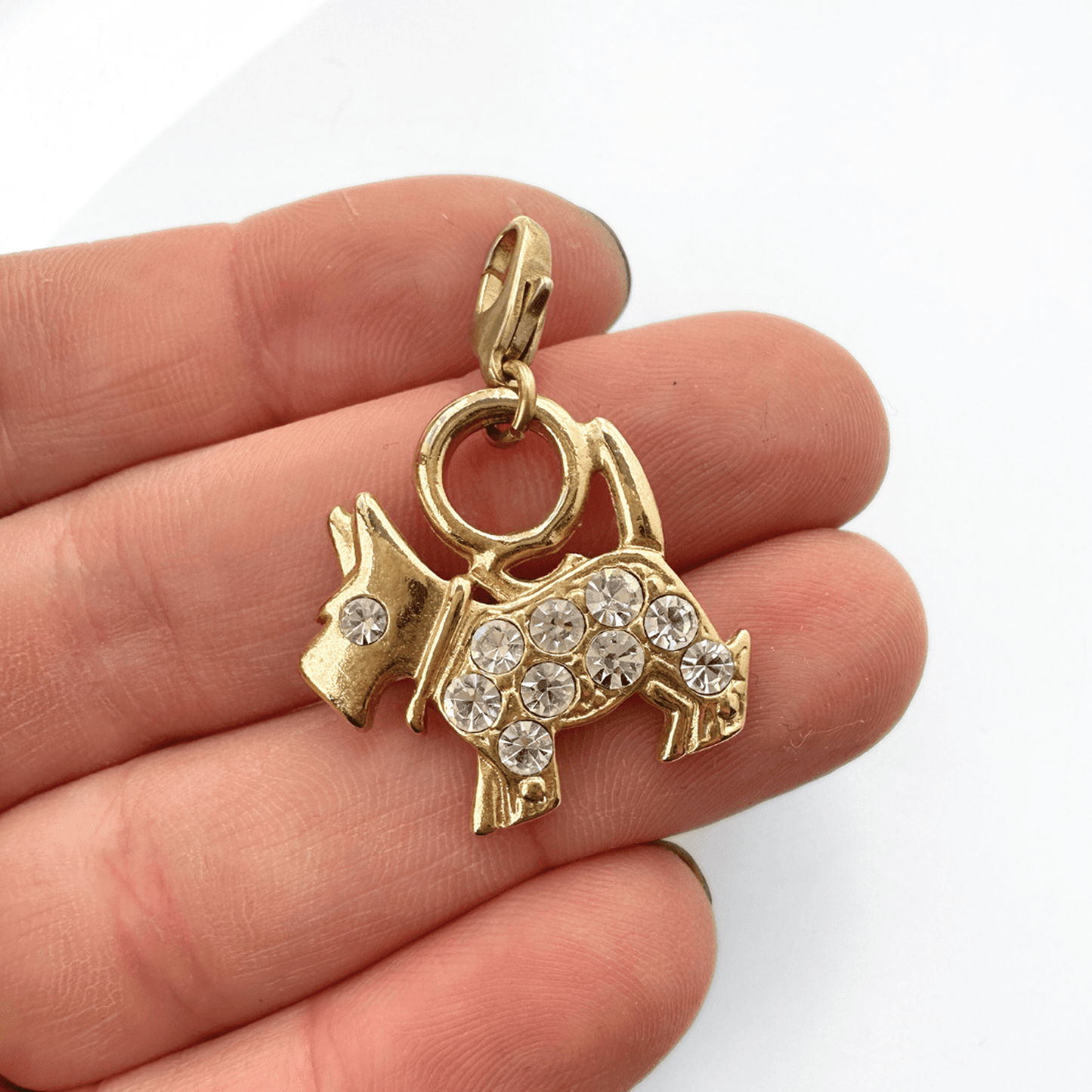 Vintage gold plated rhinestone scottie dog charm with raw brass clasp