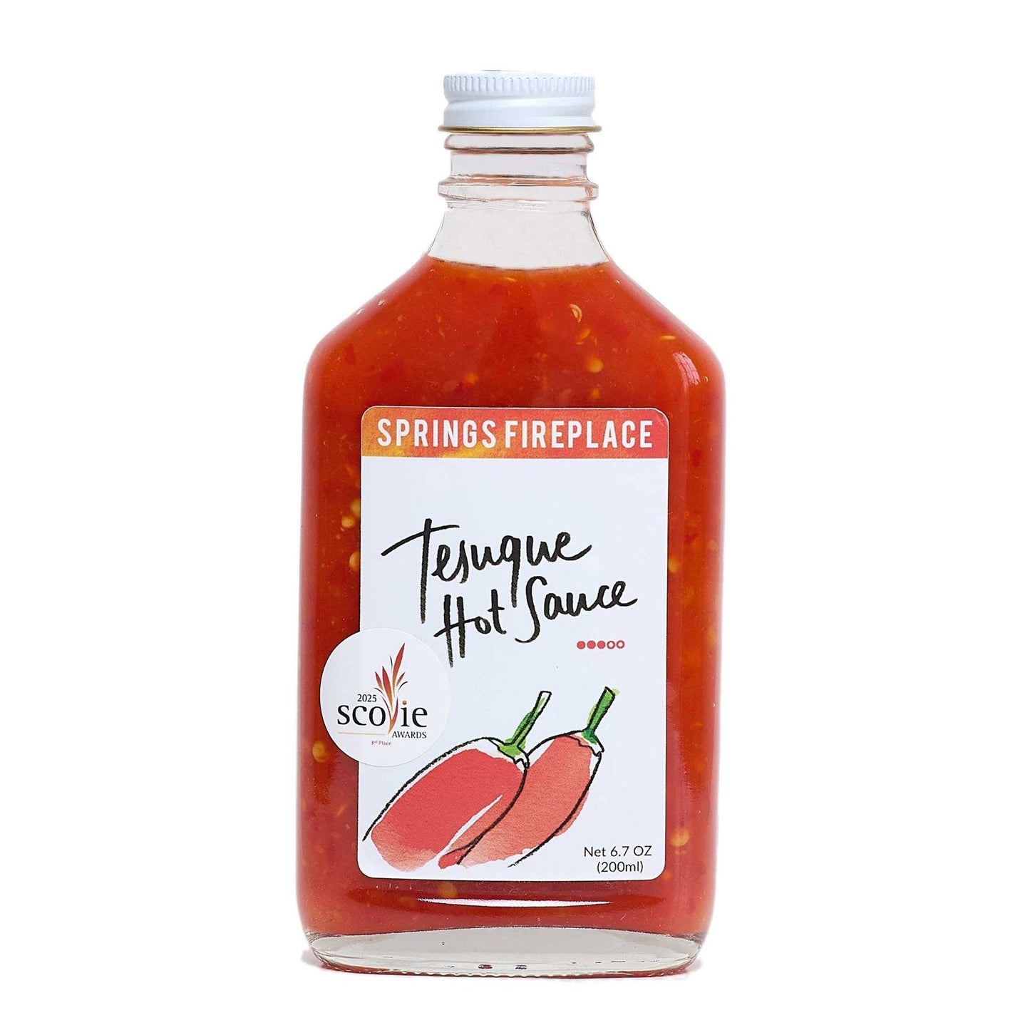 Tesuque hot sauce bottle with red chili peppers, medium heat and fruity tangy flavor.