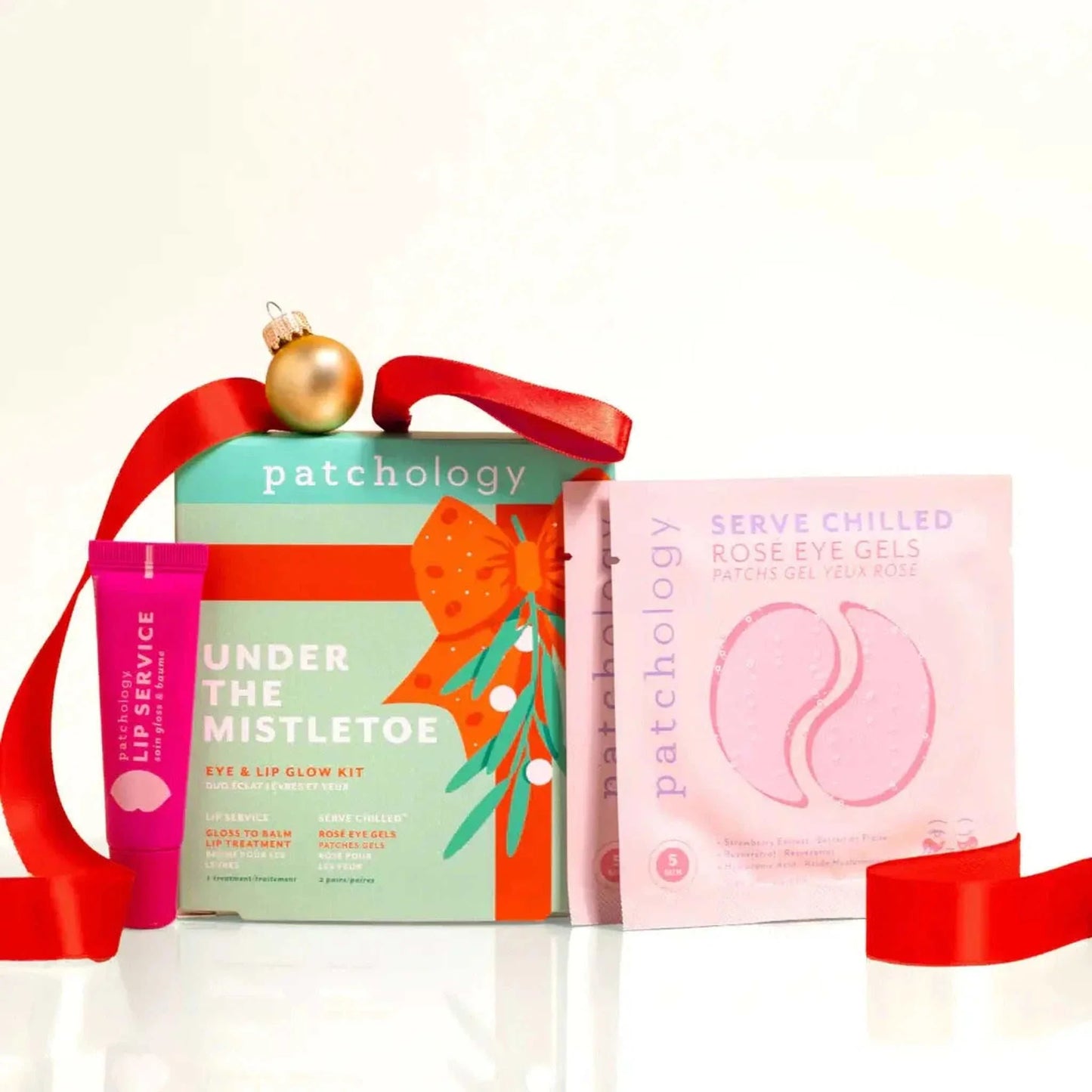 Under The Mistletoe holiday eye and lip gift set with rosé eye gels and lip gloss-to-balm for hydration and plumping