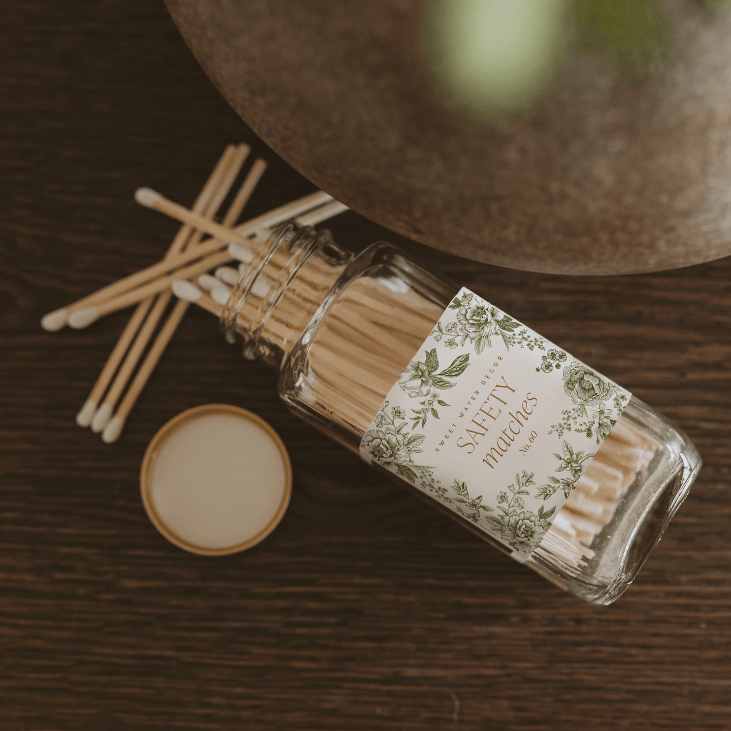 Green Delft White Tip safety matches in a decorative glass jar with classic Delft-inspired green label