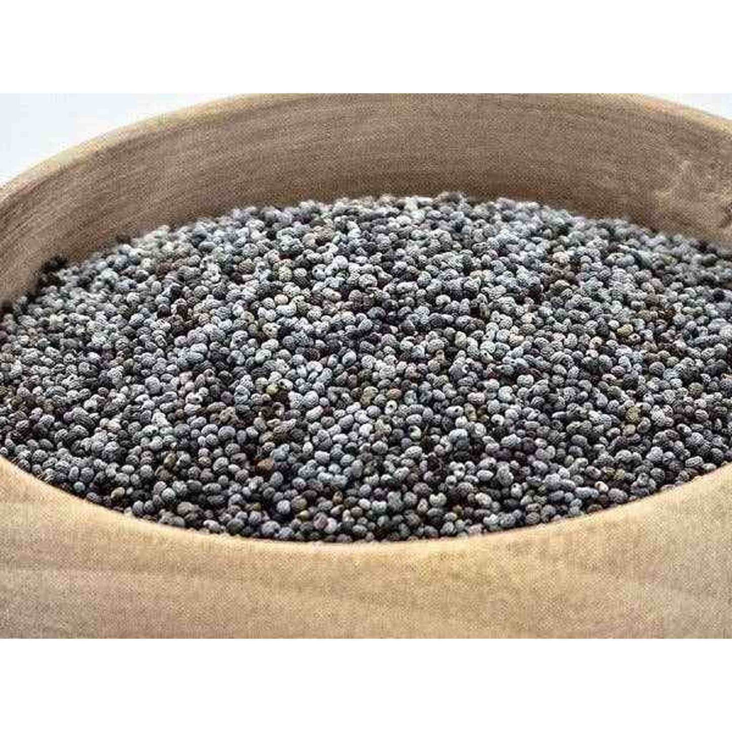 close-up of blue poppy seeds in a burlap sack from the garden